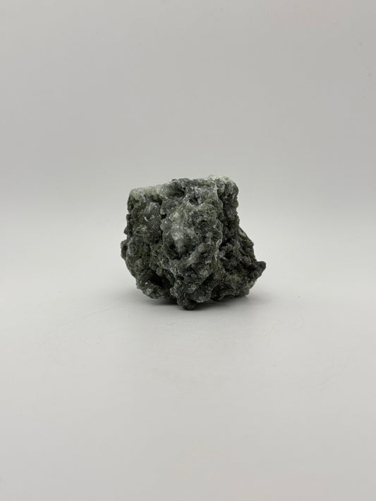 Raw prehnite specimen with amazing green color.