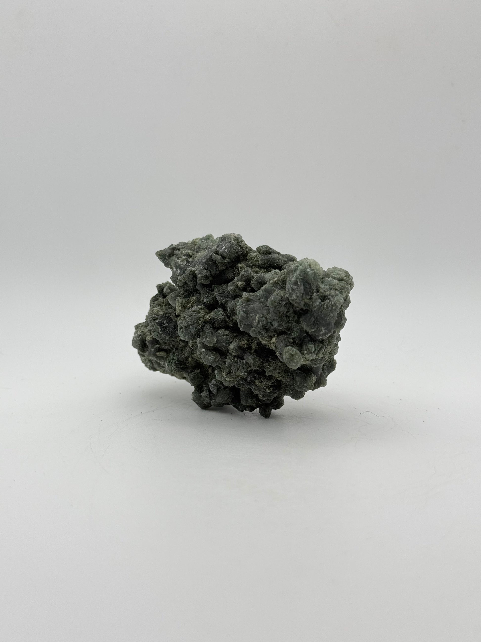 Raw prehnite specimen with amazing green color.