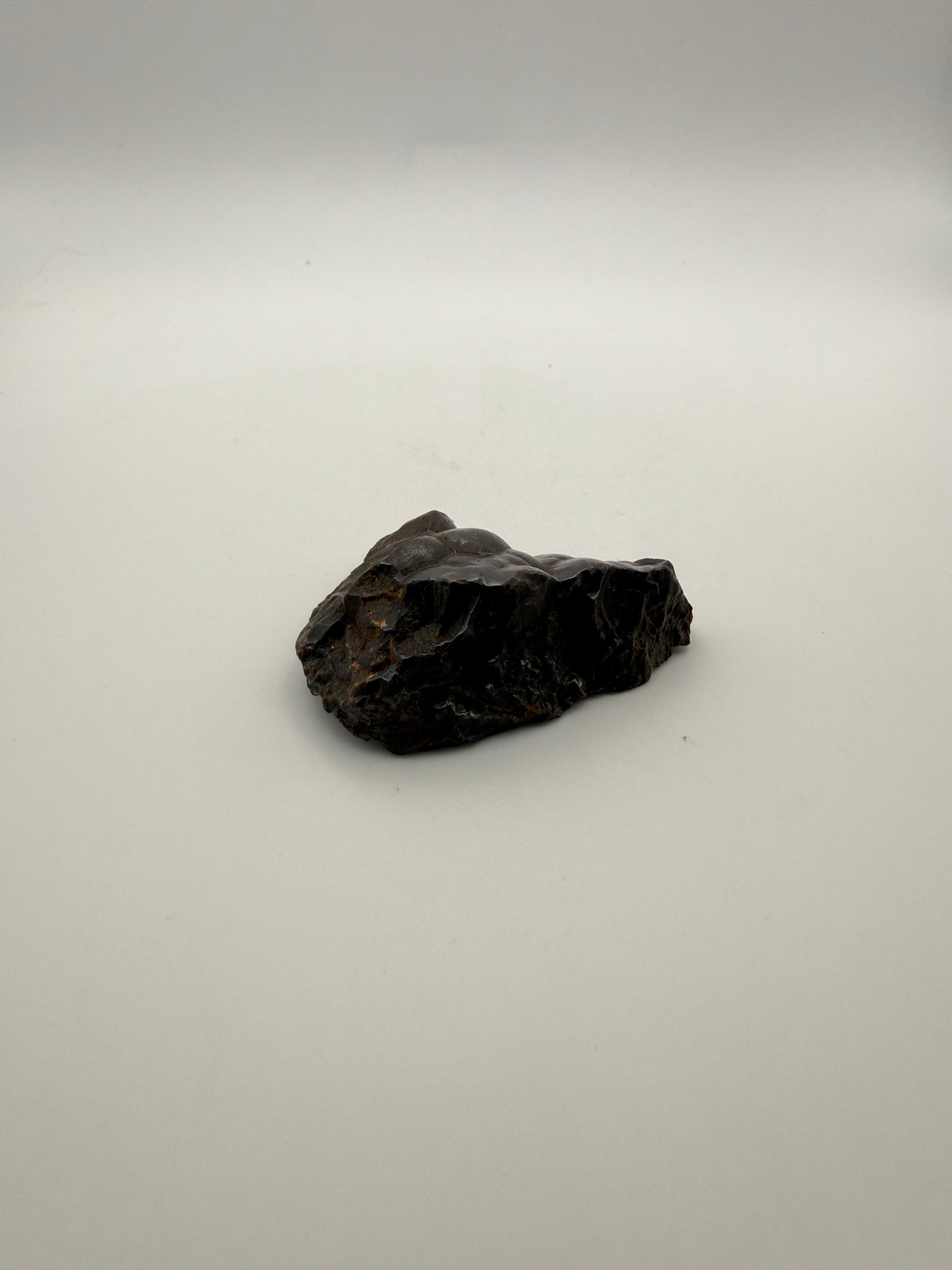 Small raw hematite specimen.