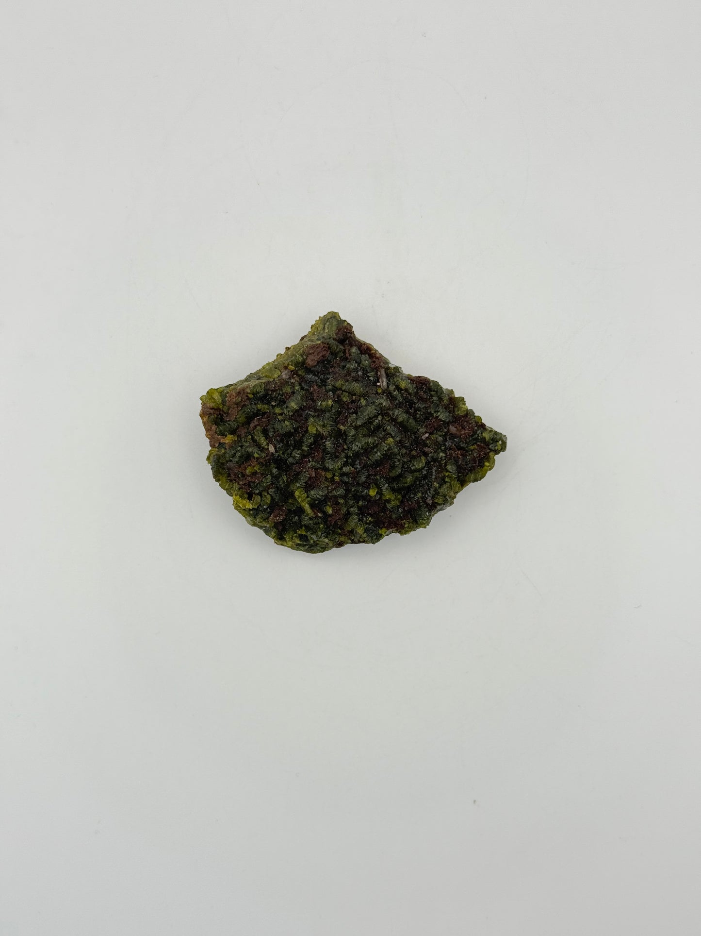 Epidote crystal cluster with good green color.
