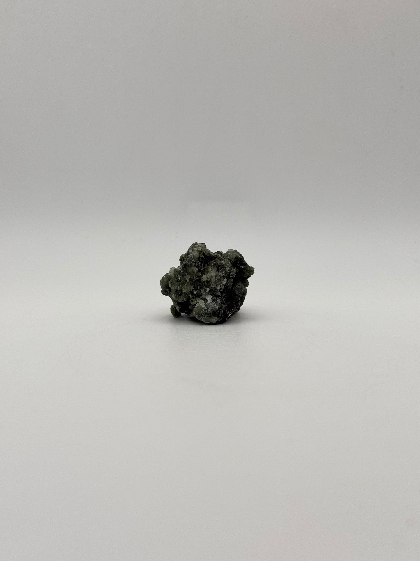 Raw prehnite specimen with amazing green color.