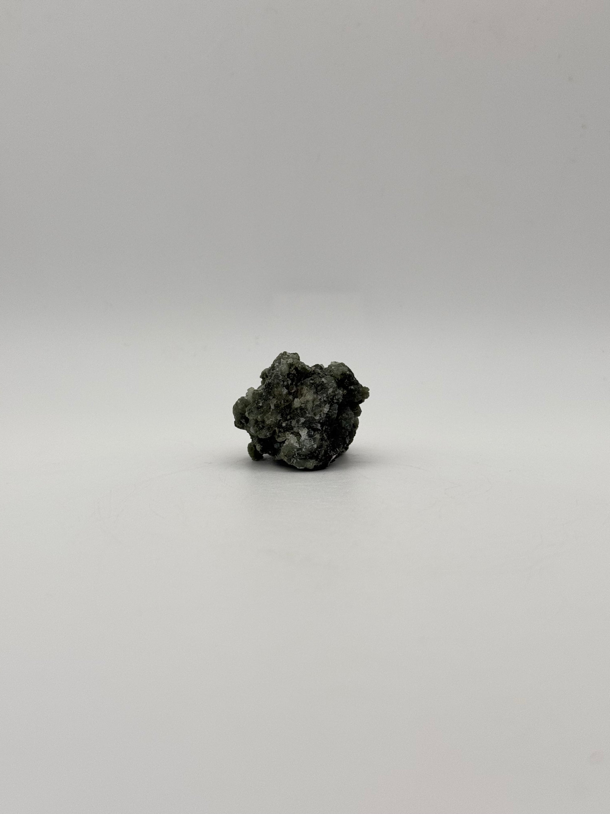 Raw prehnite specimen with amazing green color.