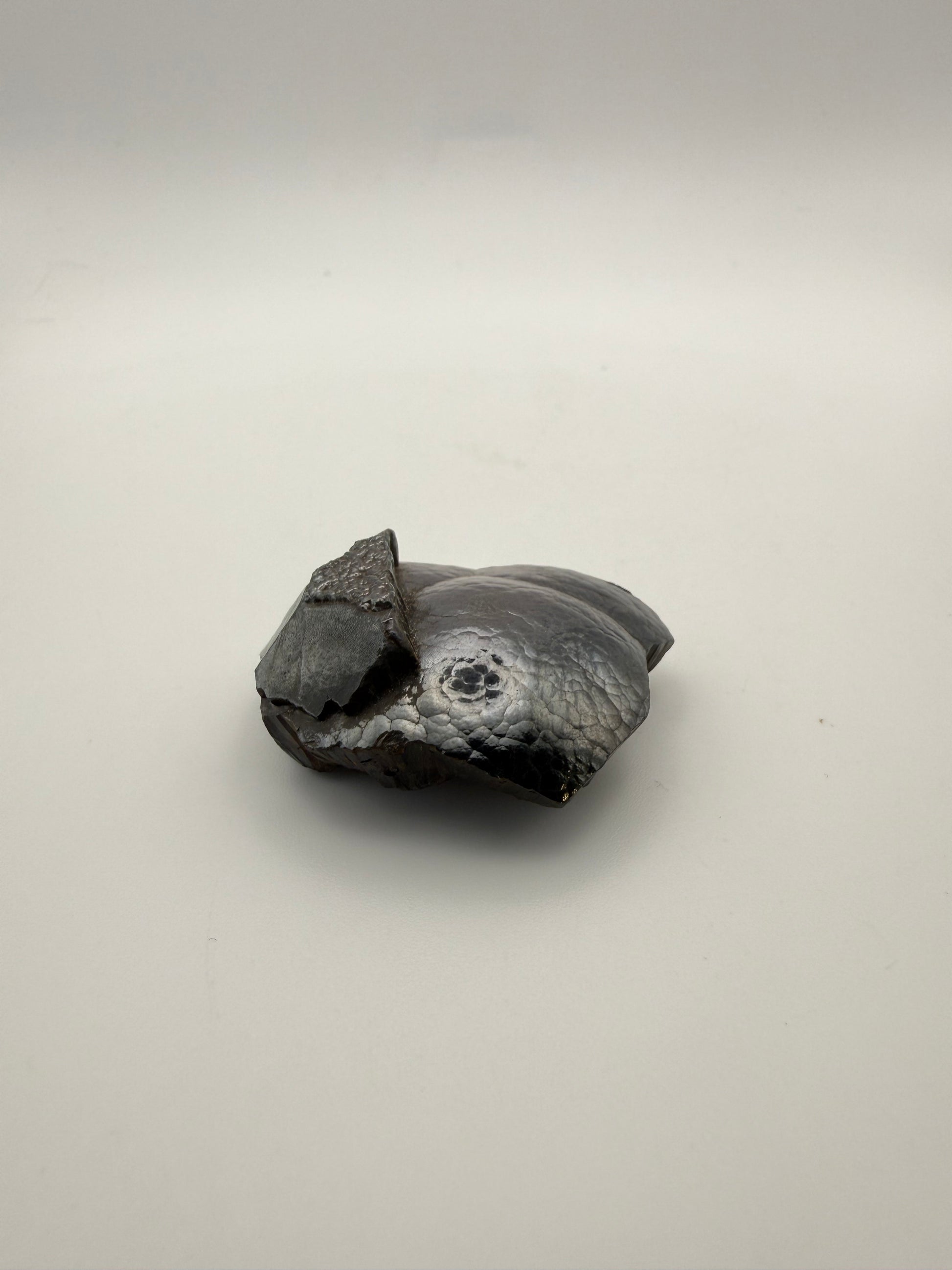 Small raw hematite specimen.