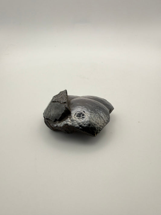 Small raw hematite specimen.