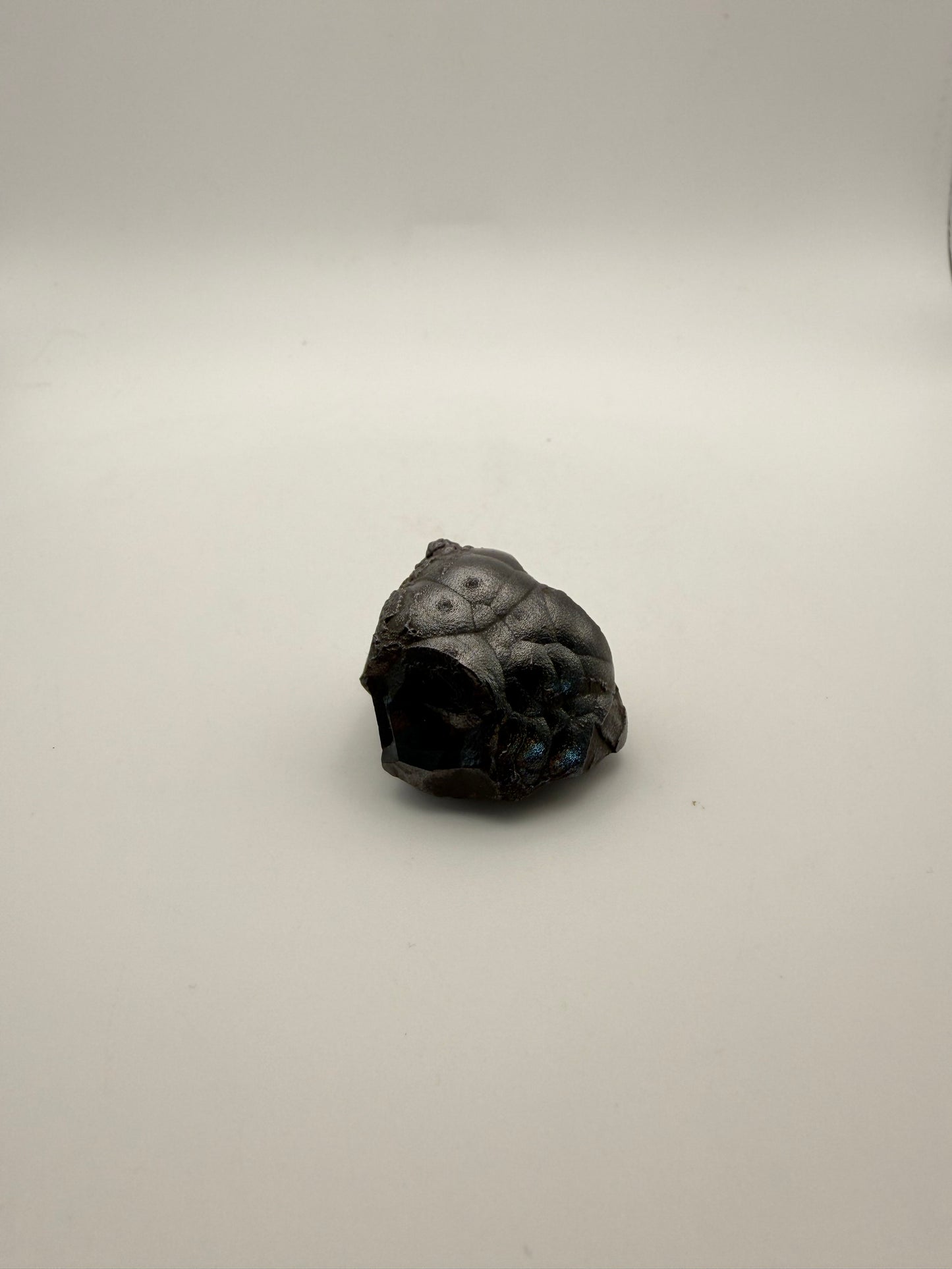 Small raw hematite specimen.