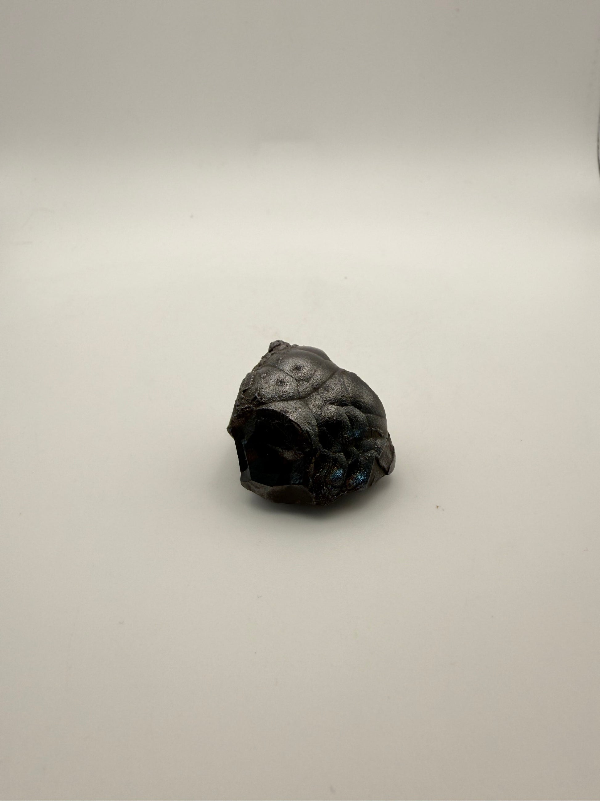 Small raw hematite specimen.
