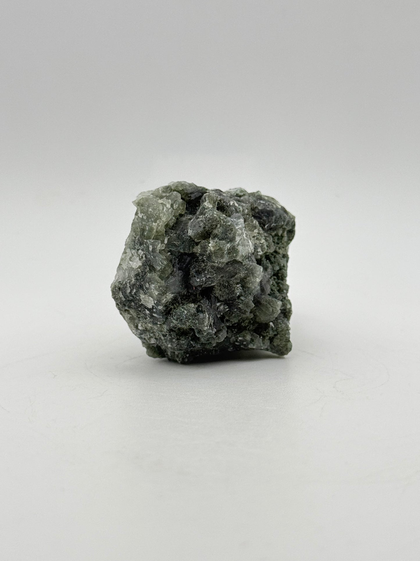 Raw prehnite specimen with amazing green color.