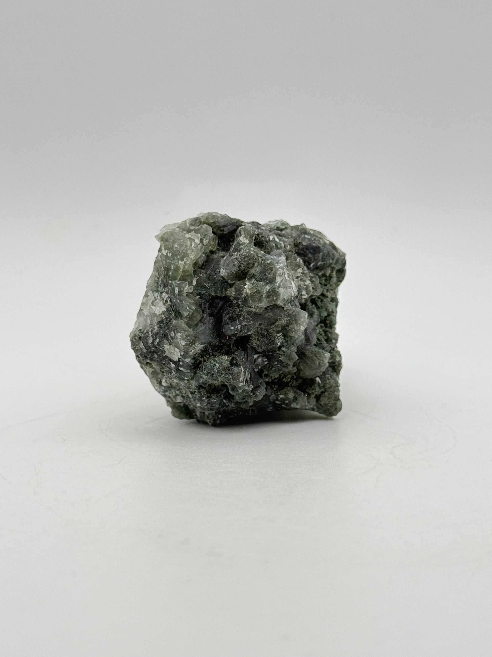 Raw prehnite specimen with amazing green color.