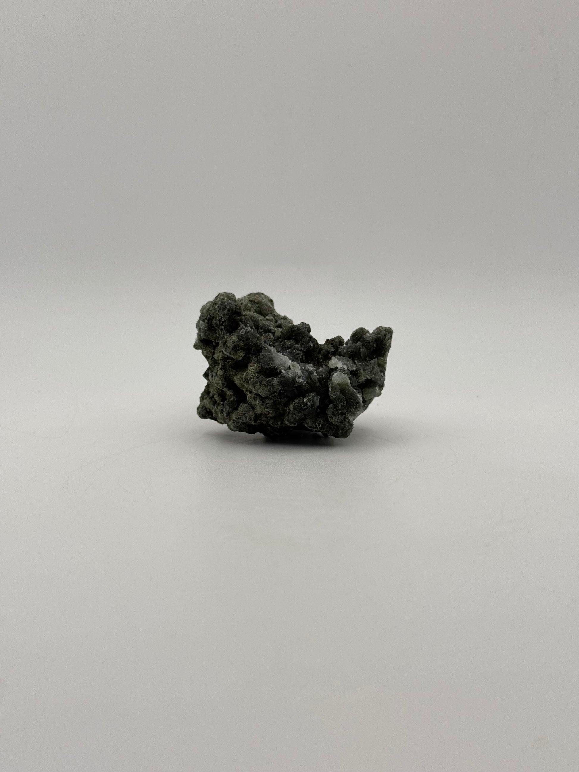 Raw prehnite specimen with amazing green color.