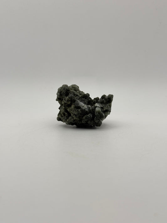 Raw prehnite specimen with amazing green color.