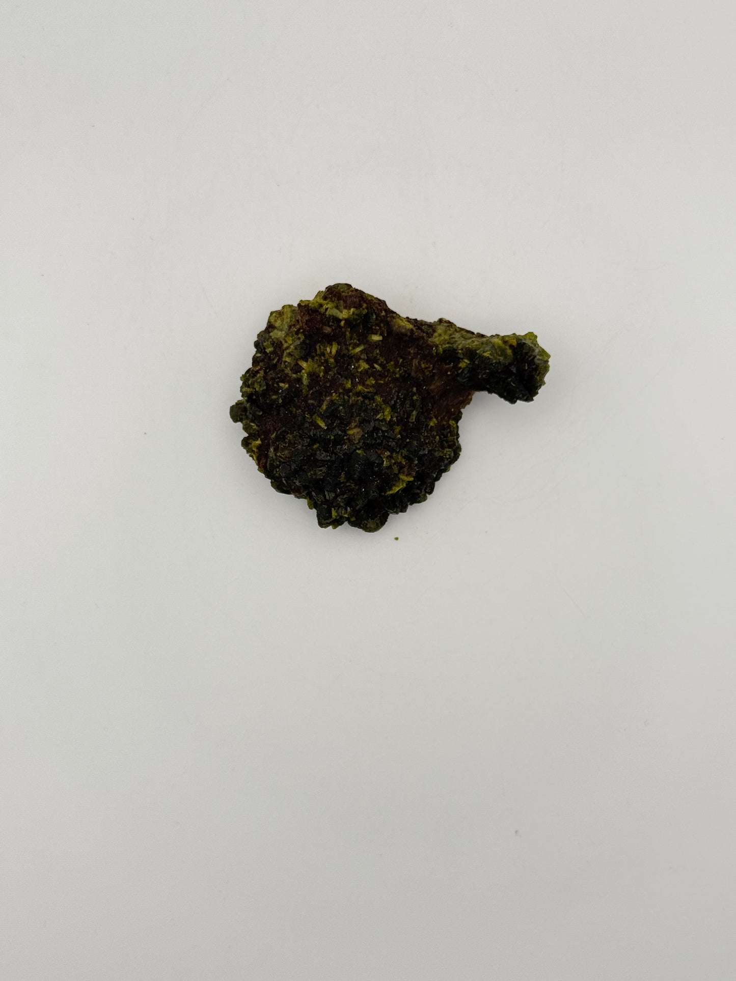 Epidote crystal cluster with good green color.