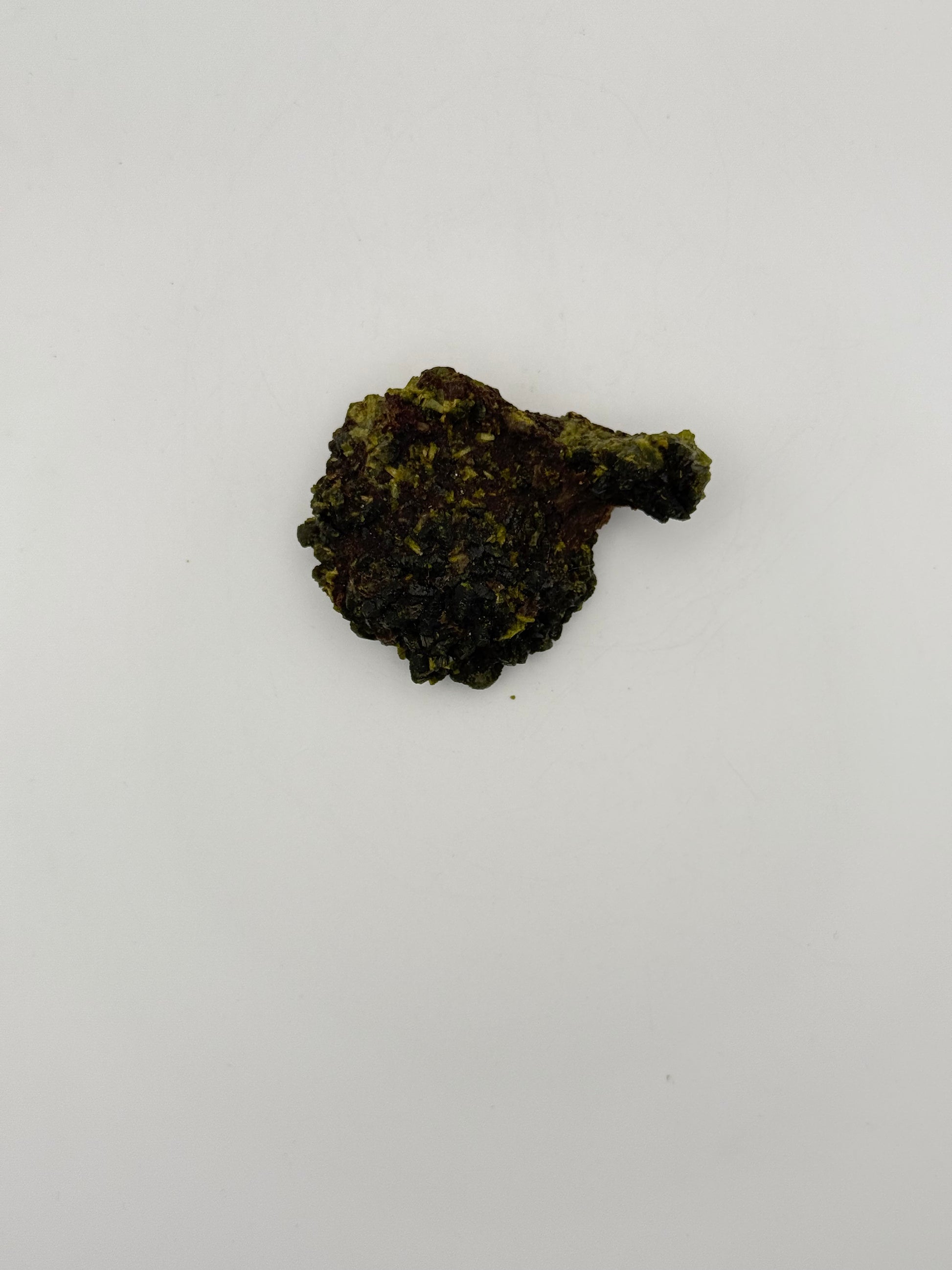 Epidote crystal cluster with good green color.