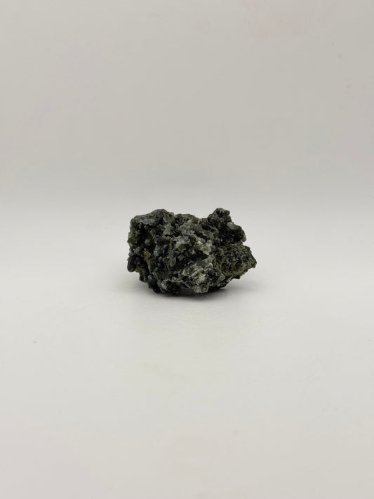 Raw prehnite specimen with amazing green color.