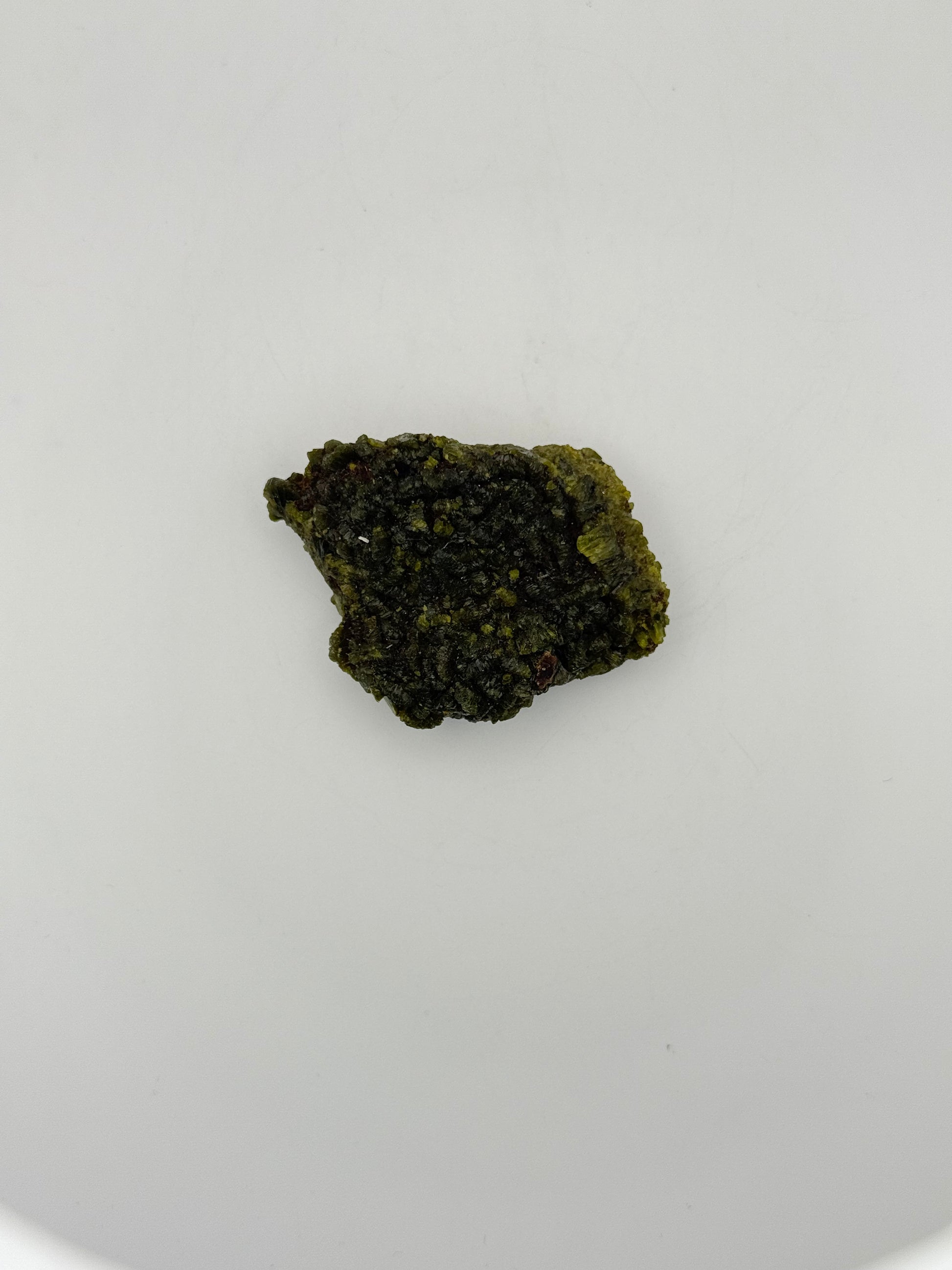 Epidote crystal cluster with good green color.