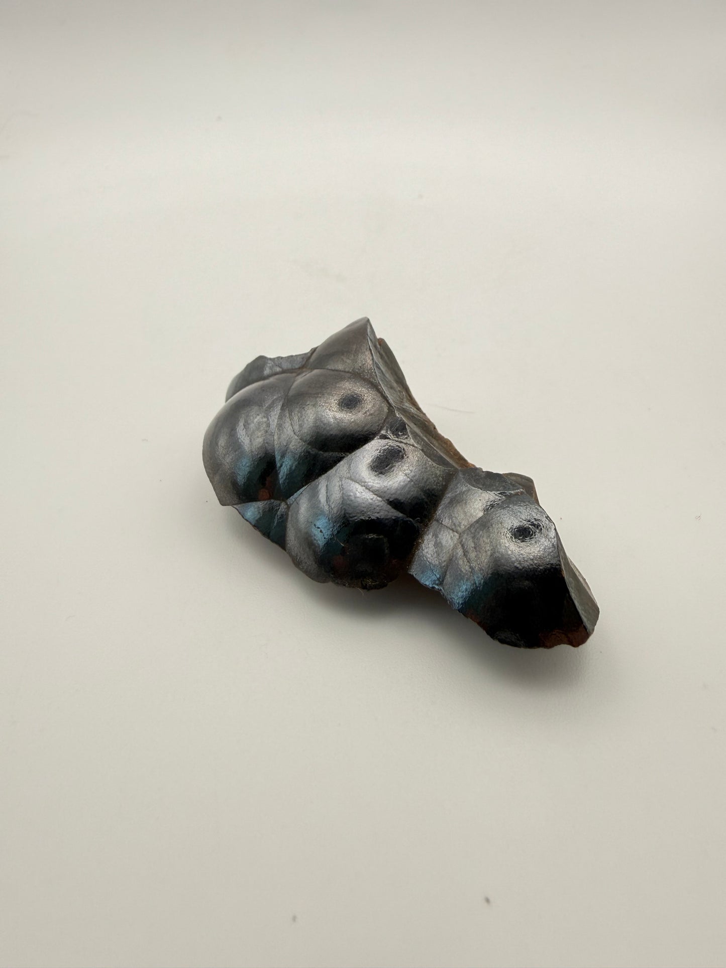 Small raw hematite specimen.