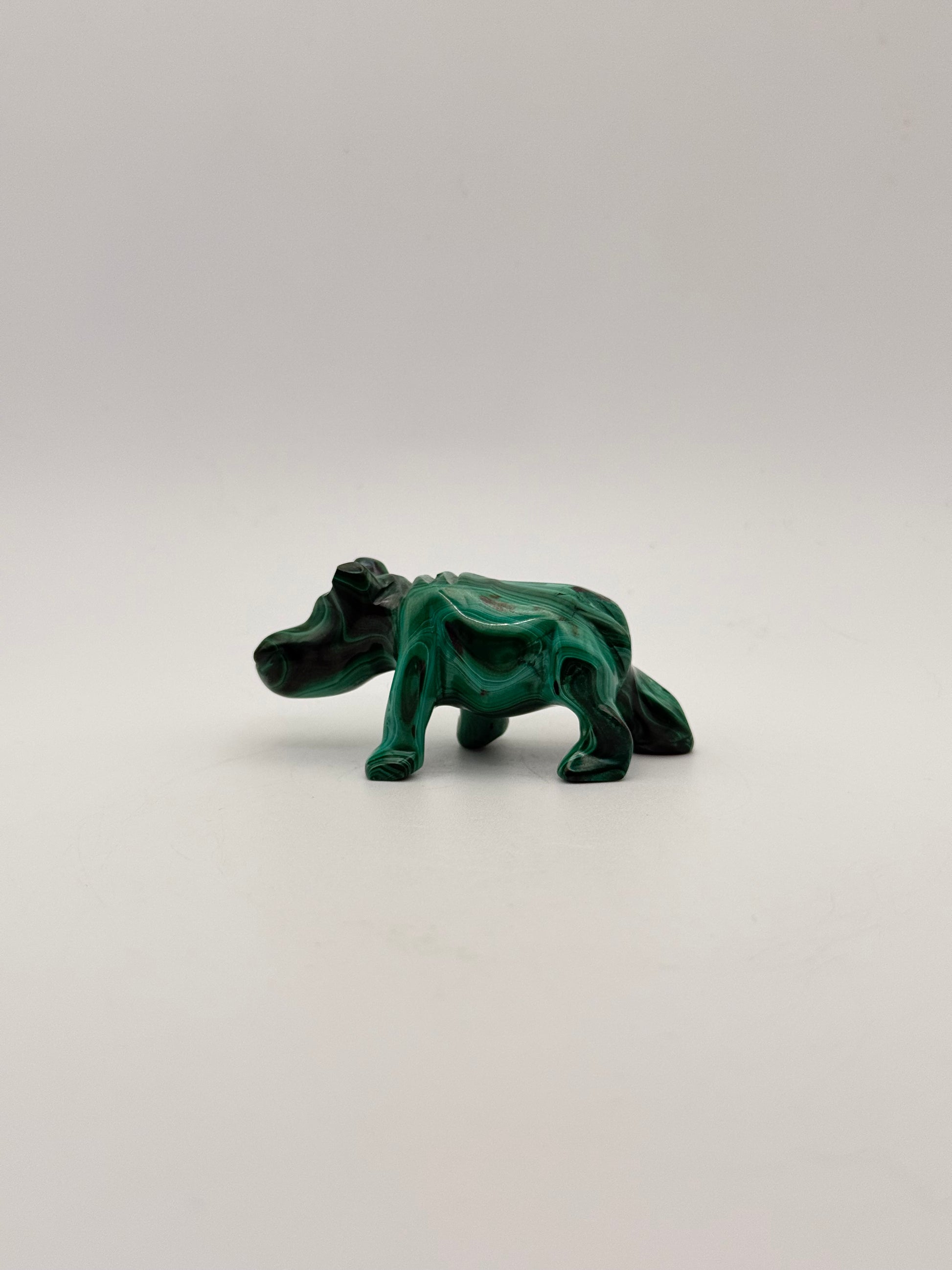 Malachite hippo carving.