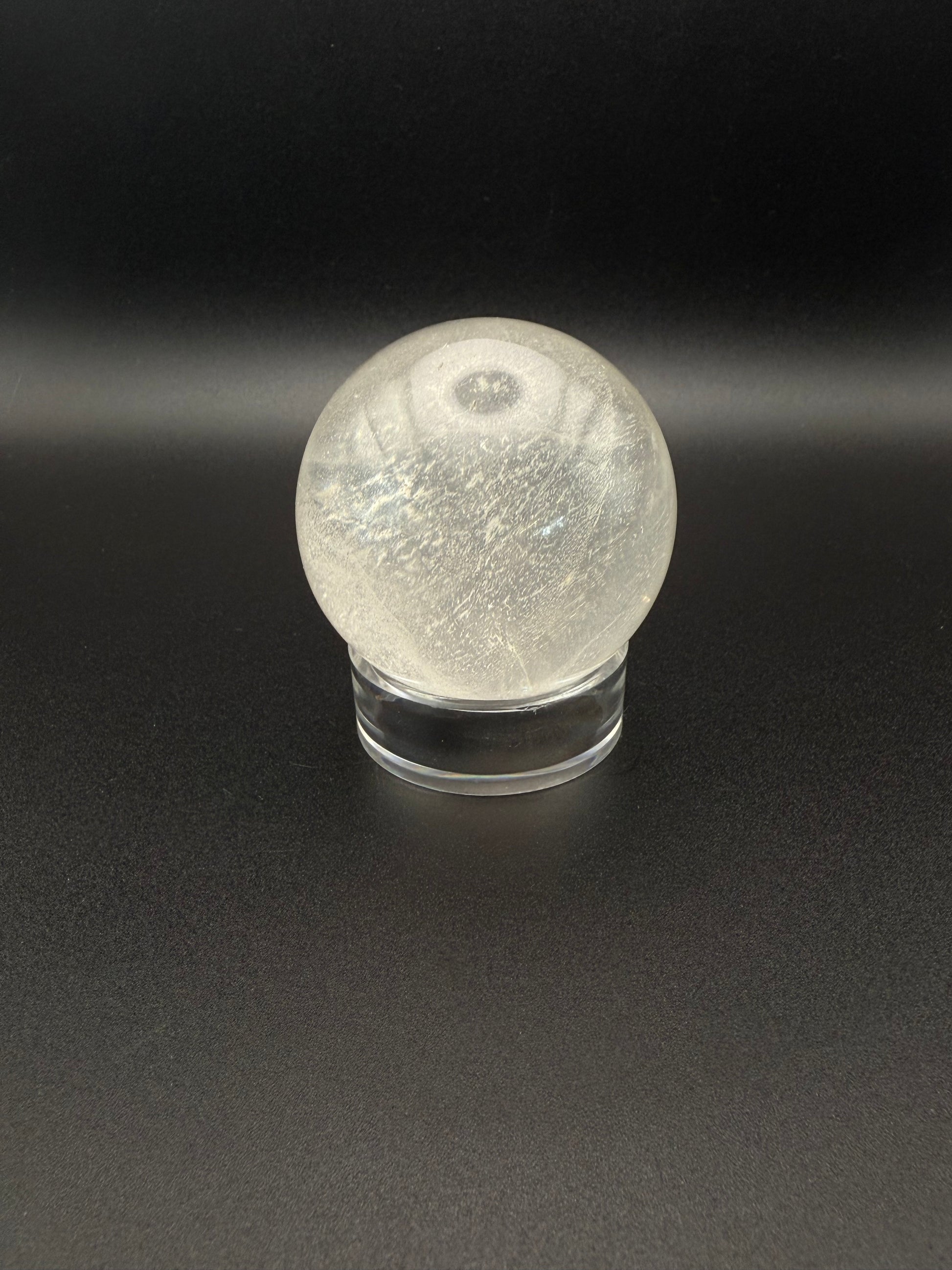 Clear quartz polished crystal sphere.