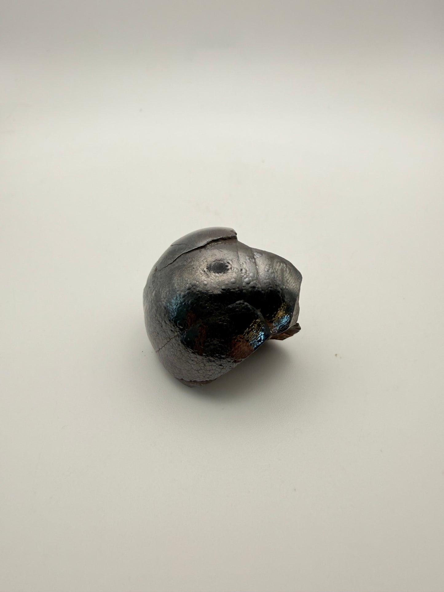 Small raw hematite specimen.