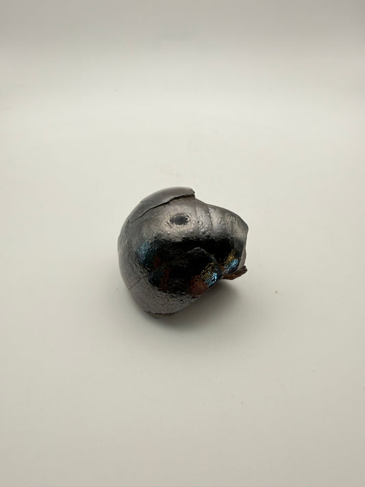 Small raw hematite specimen.