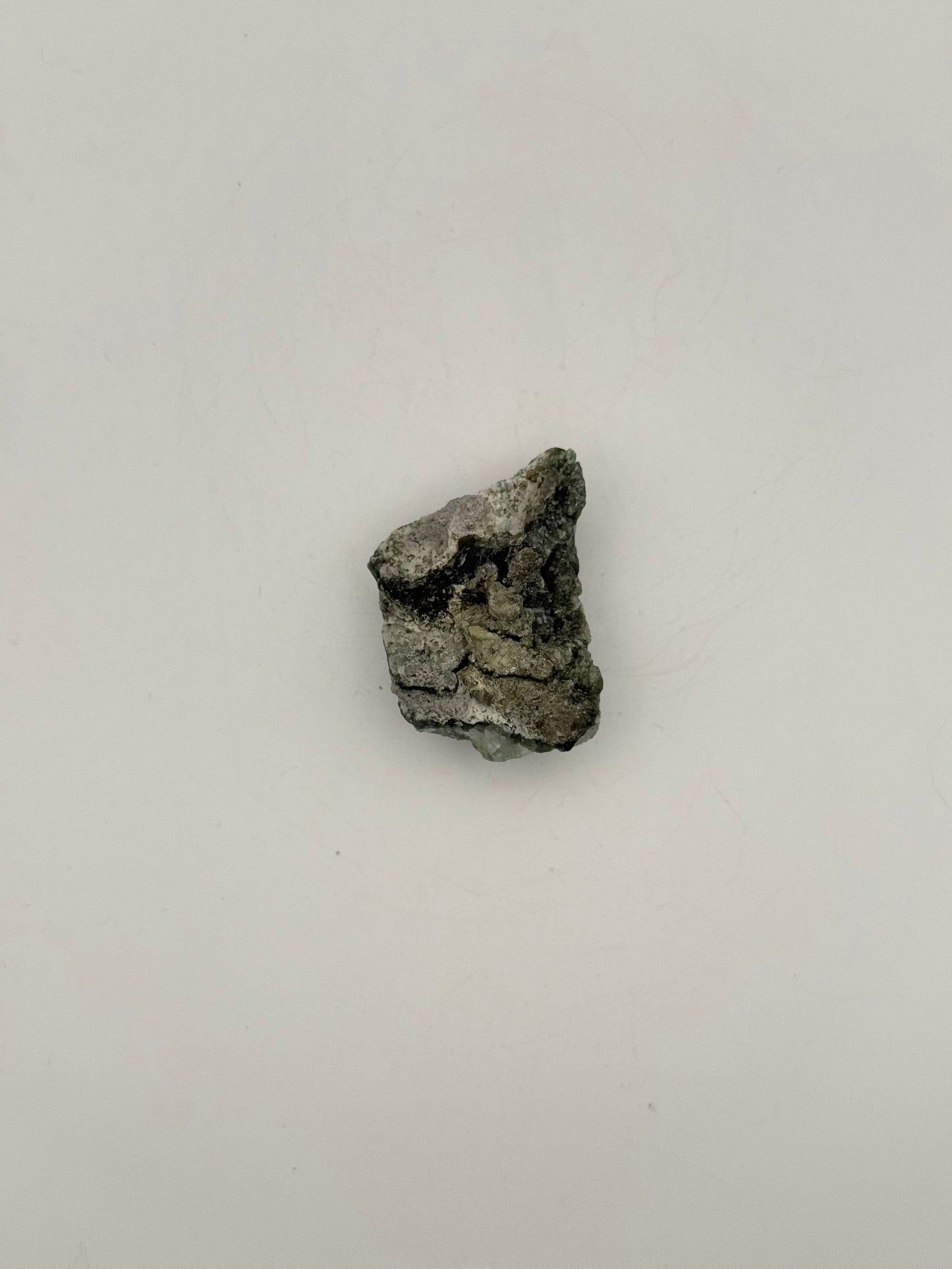 Raw prehnite specimen with amazing green color.