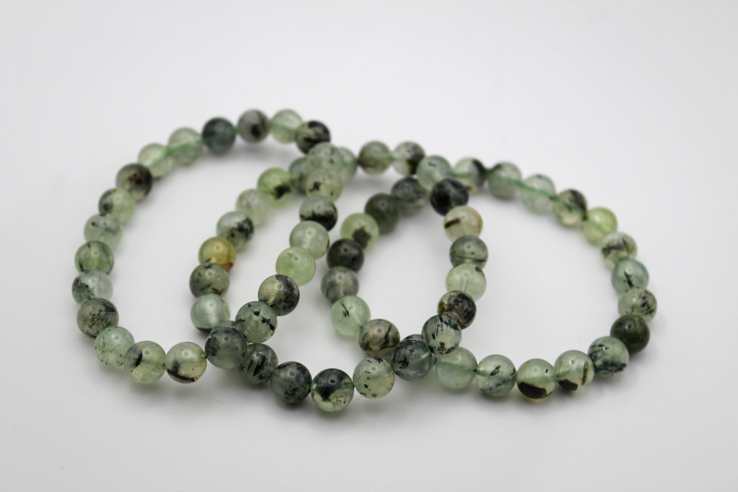 A beaded prehnite bracelet.