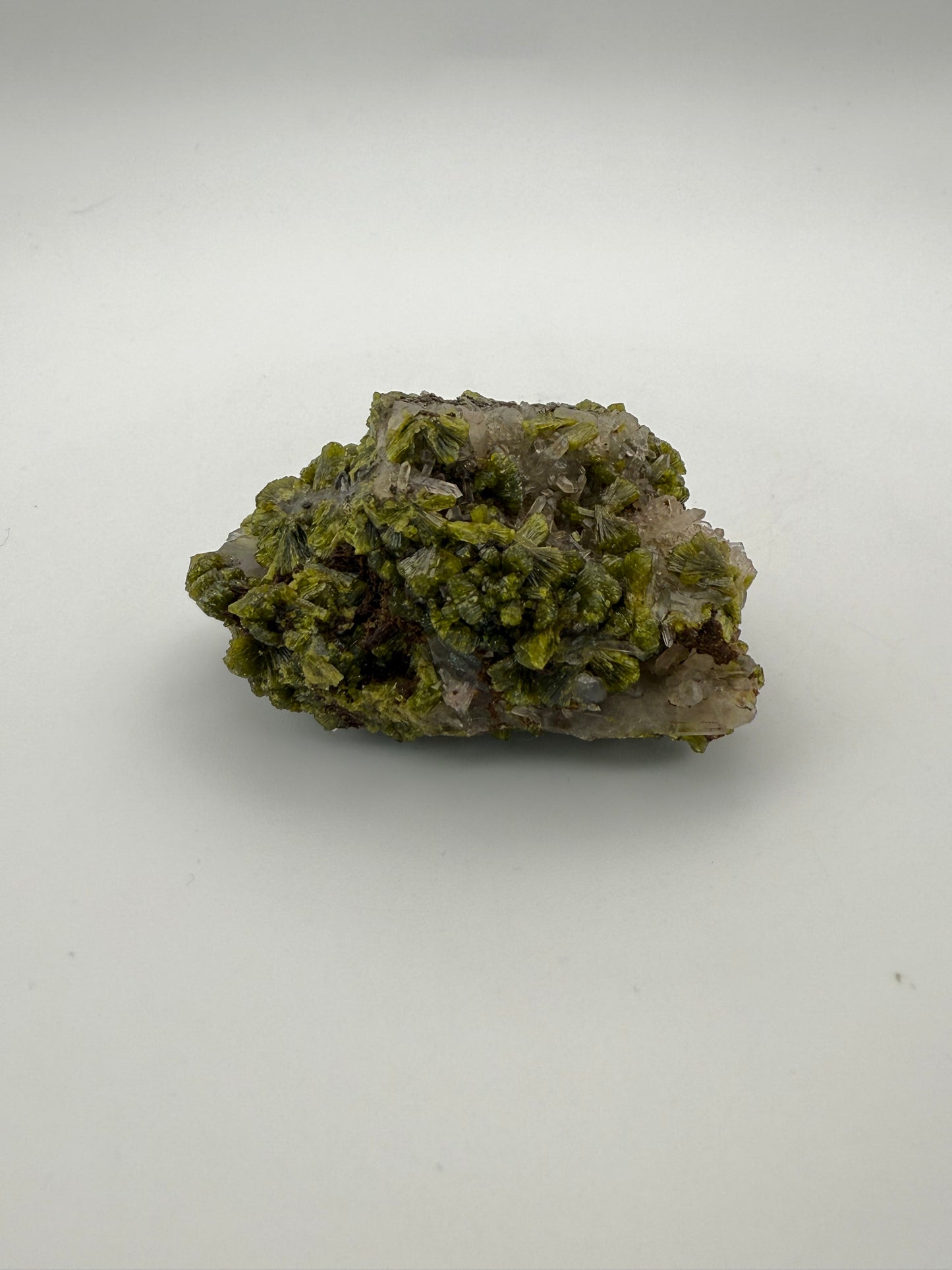 Epidote crystal cluster with good green color.