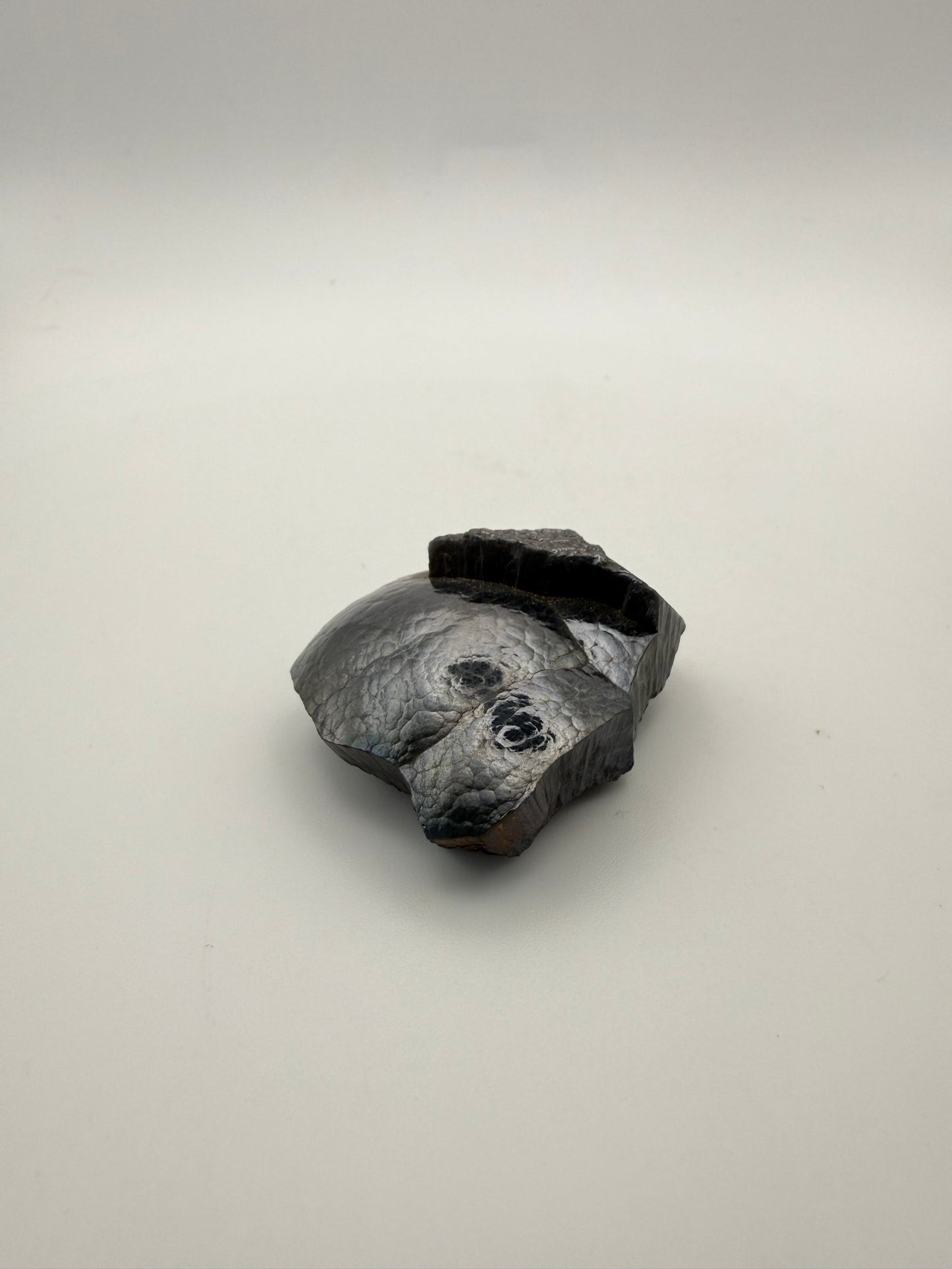 Small raw hematite specimen.
