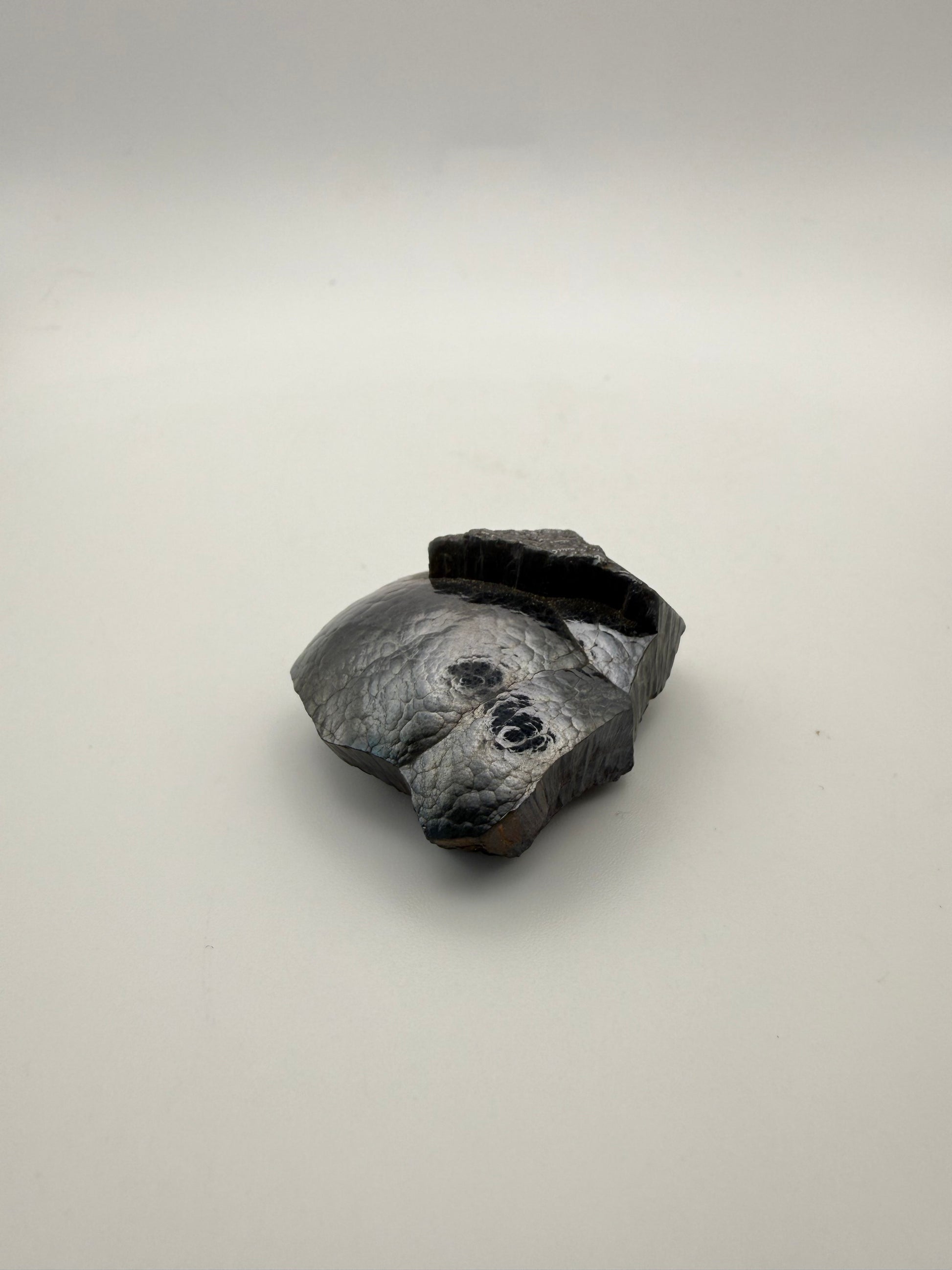 Small raw hematite specimen.