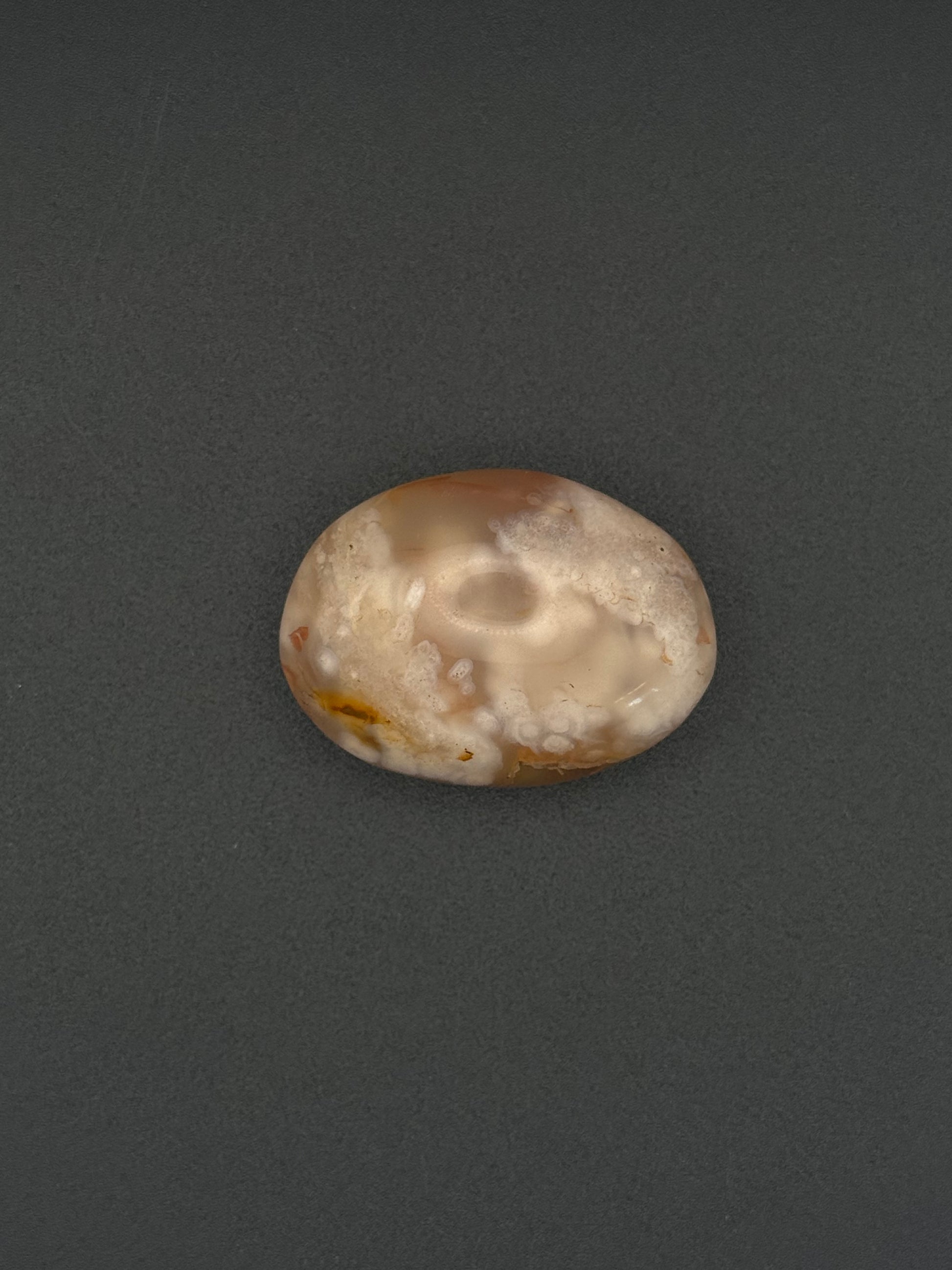 Flower agate polished crystal palm stone.