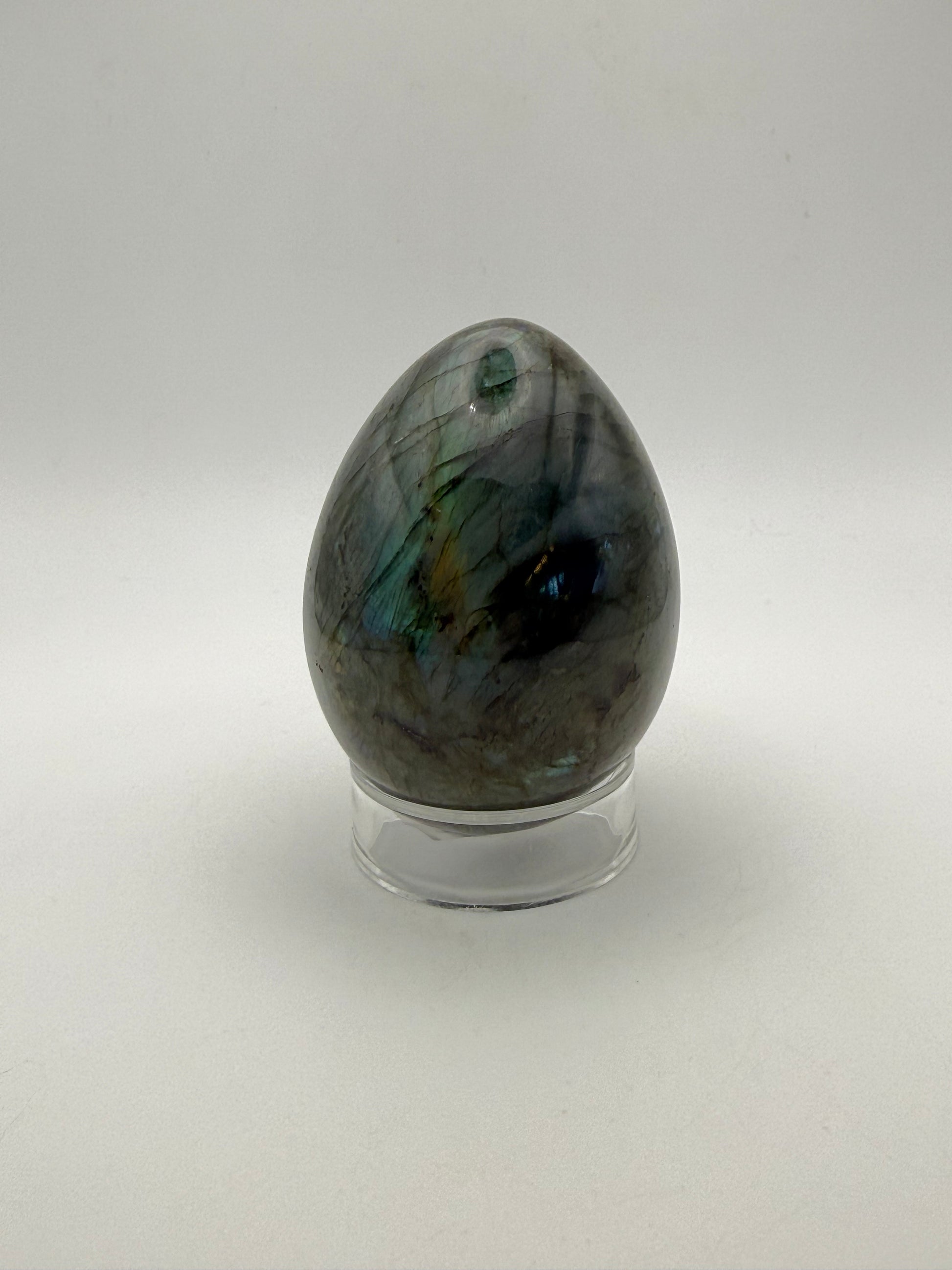Labradorite polished stone in the shape of an egg.