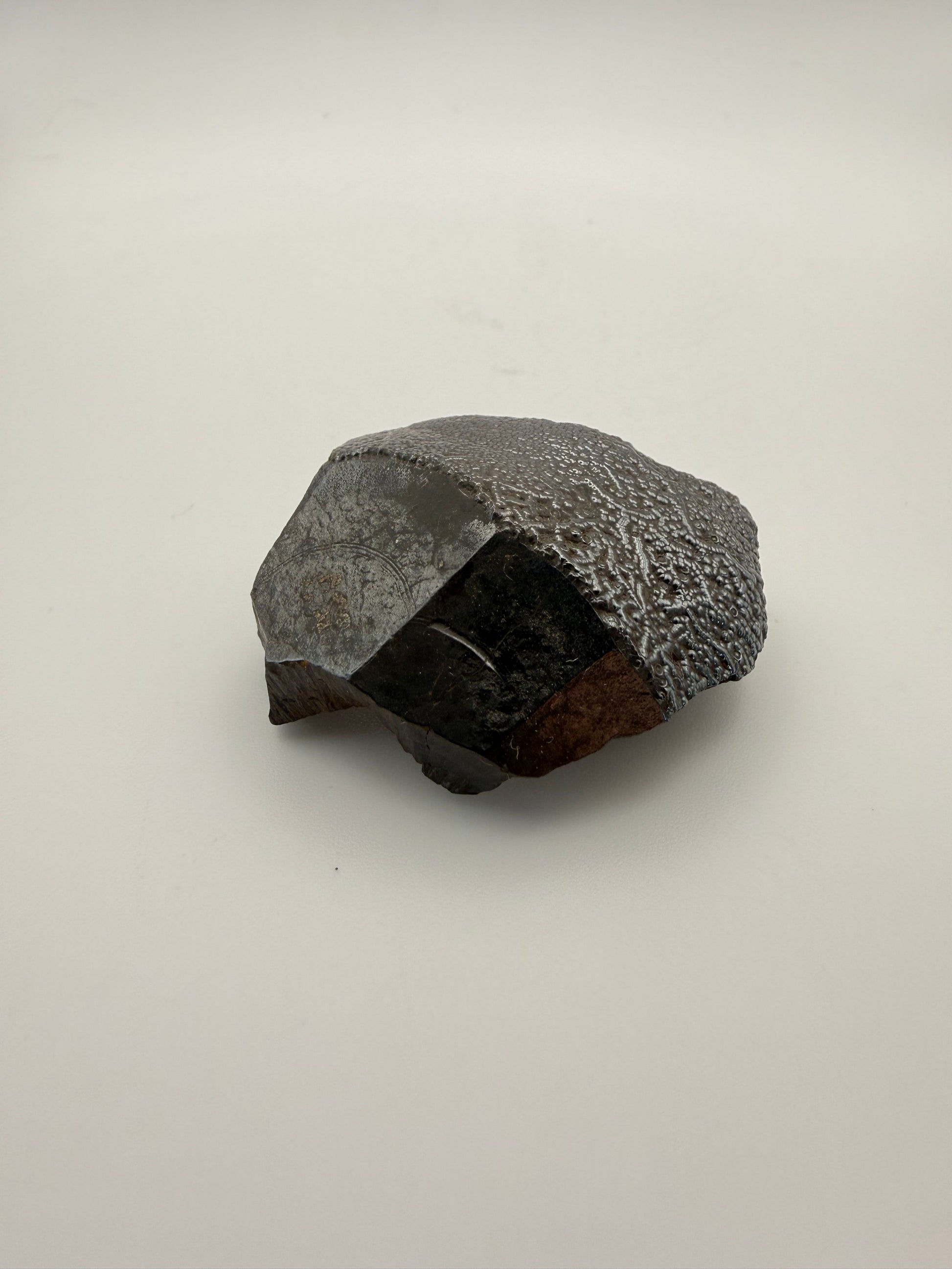 Small raw hematite specimen.