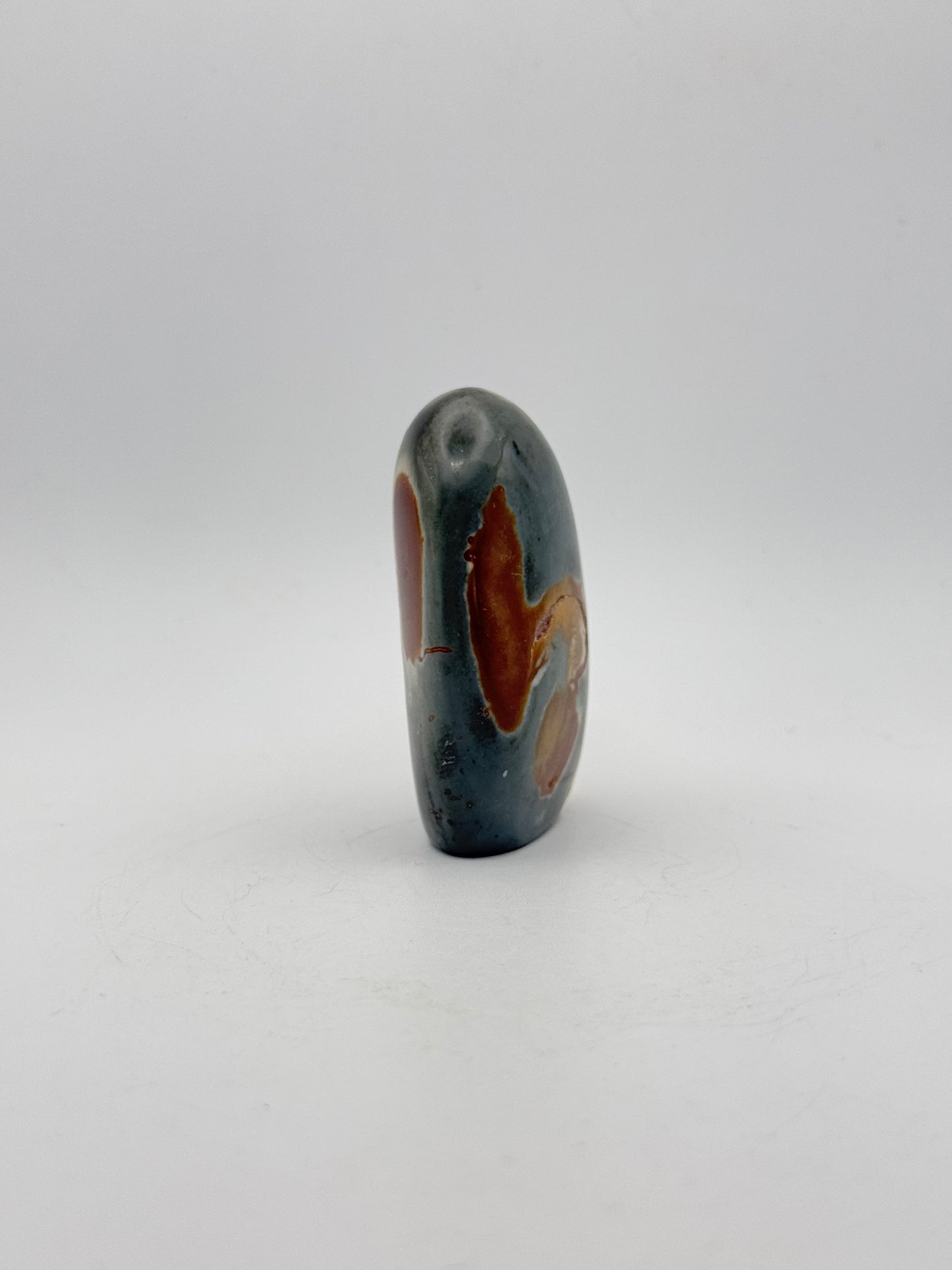 A polished polychrome jasper free from.