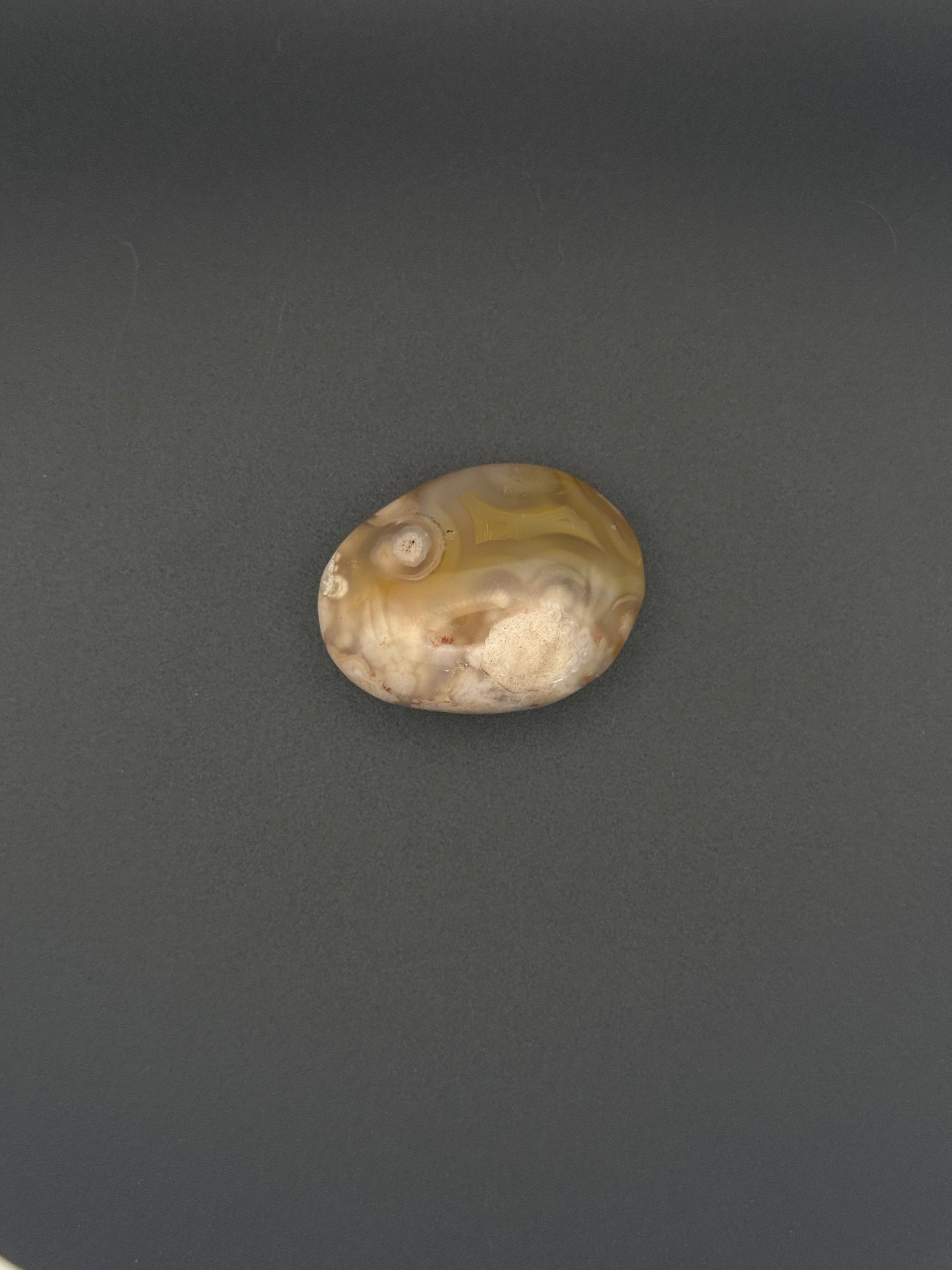 Flower agate polished crystal palm stone.