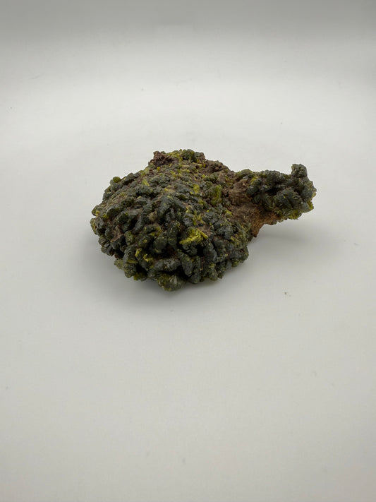Epidote crystal cluster with good green color.