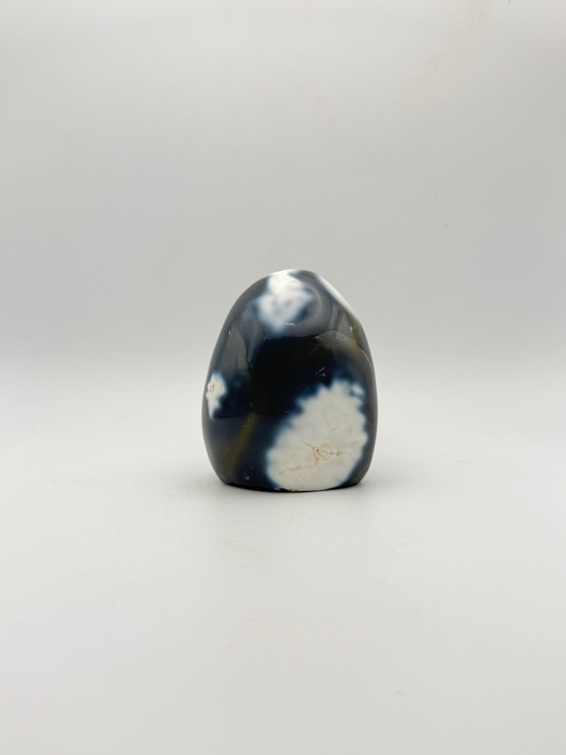Polished orca agate free form.