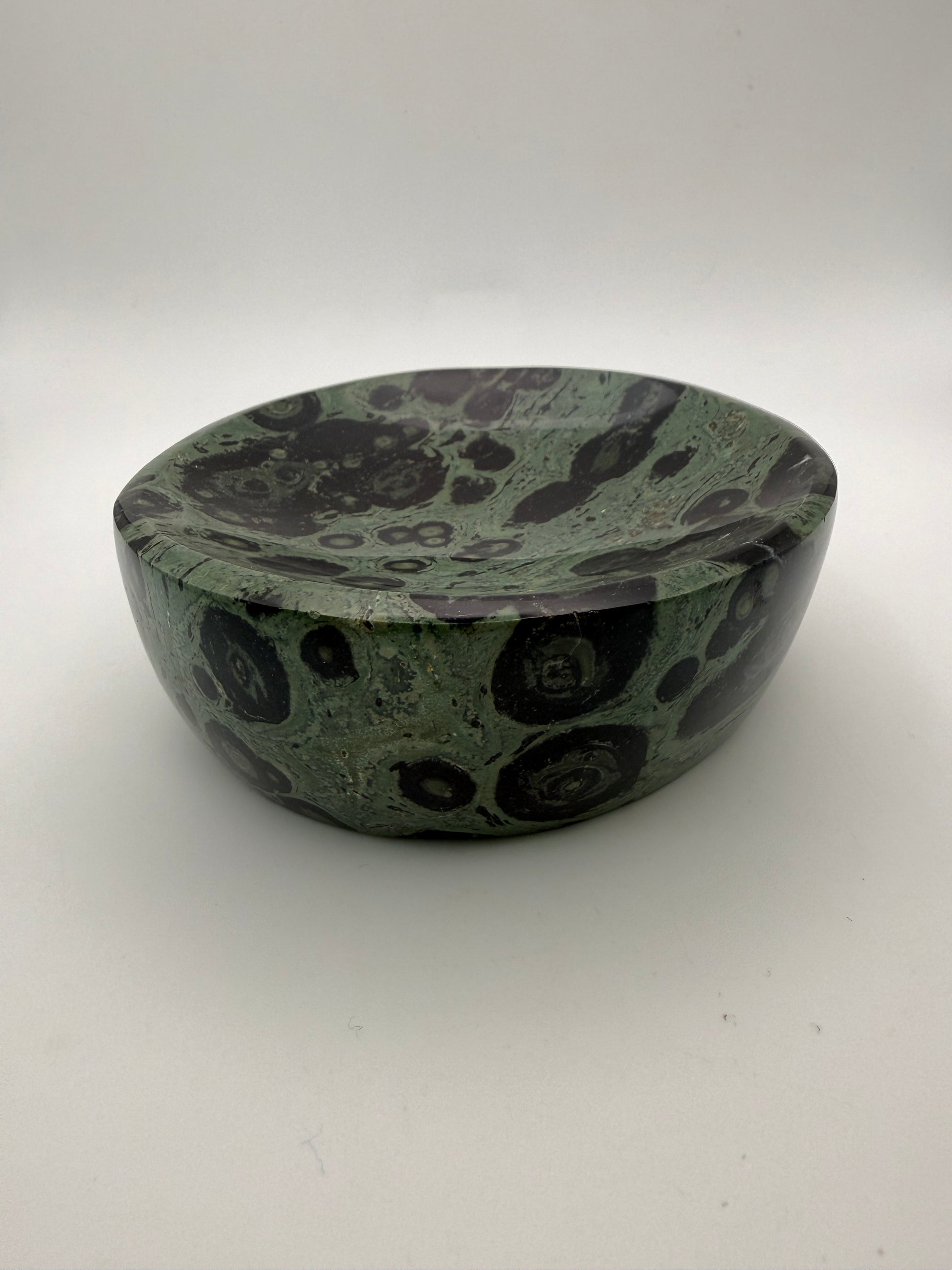 Polished kambaba jasper in the shape of a bowl.
