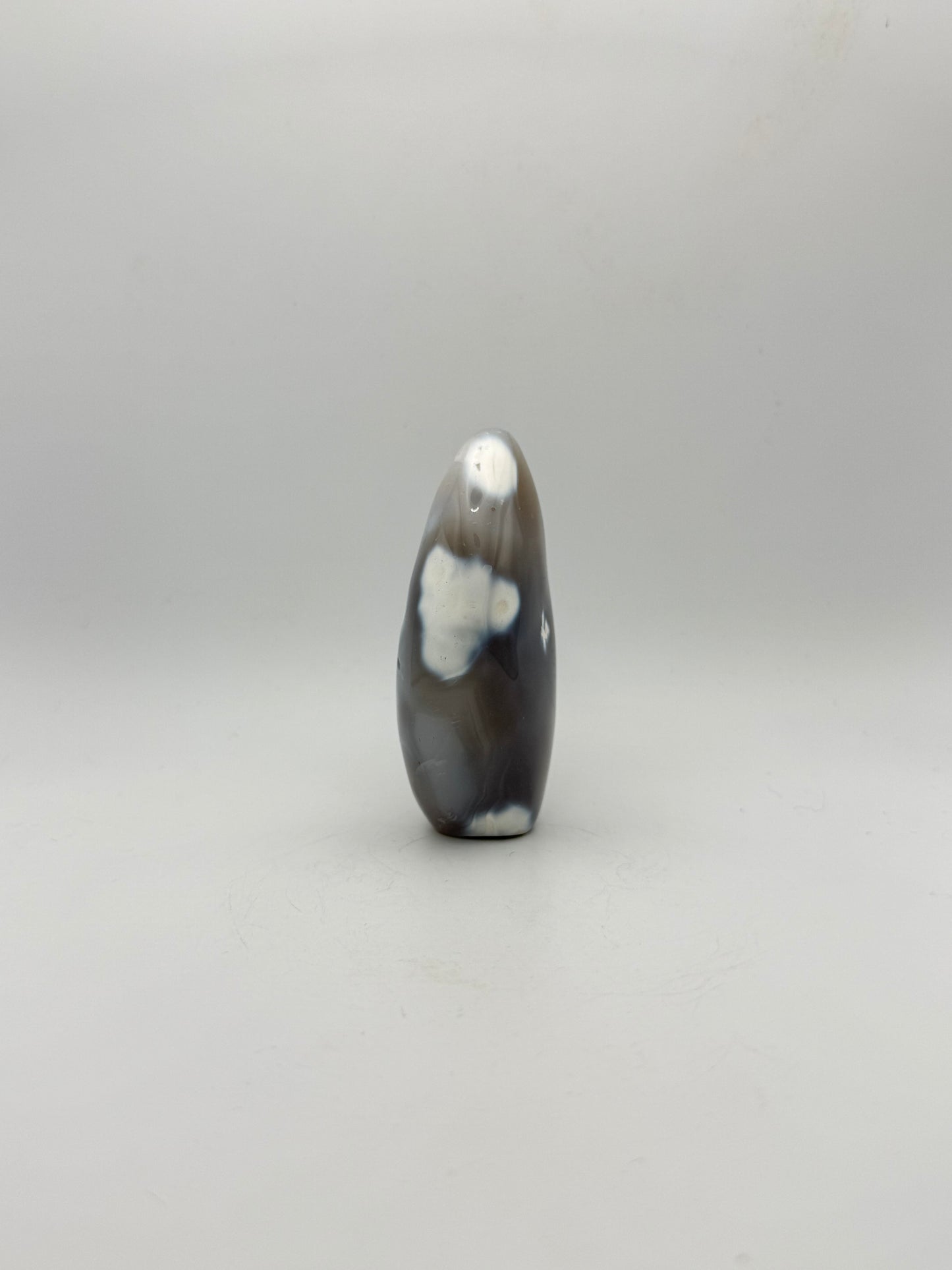 Polished orca agate free form.