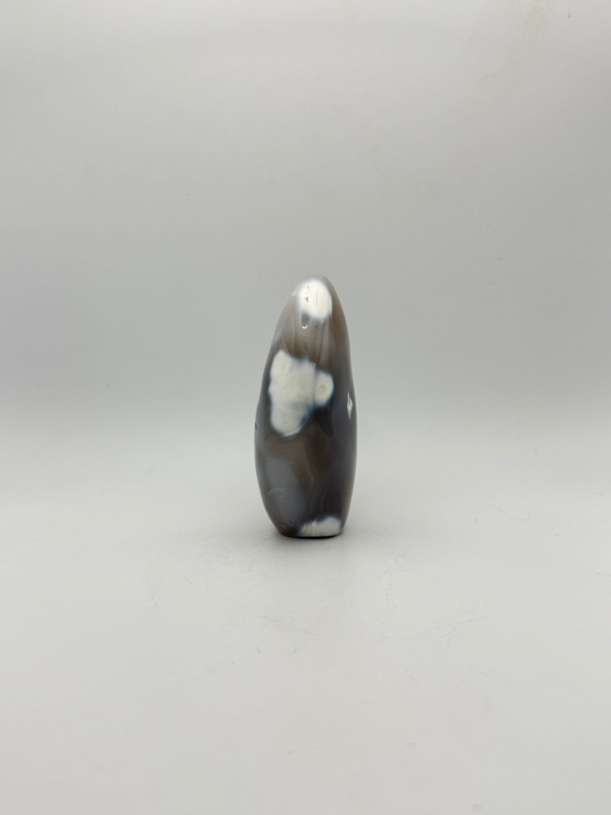 Polished orca agate free form.