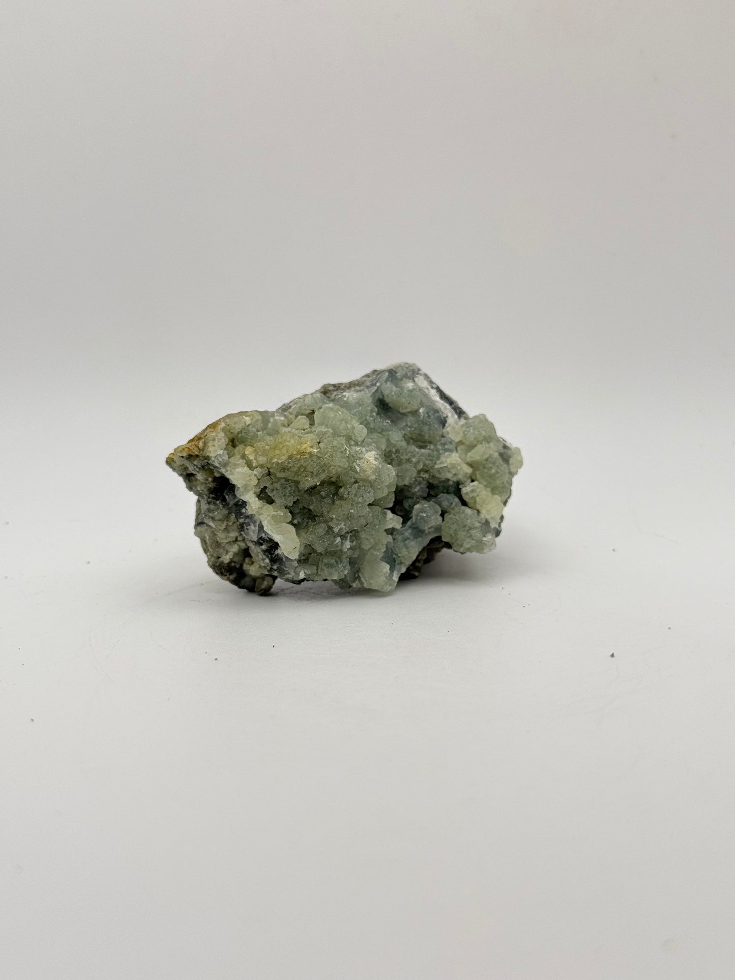 Raw prehnite specimen with amazing green color.