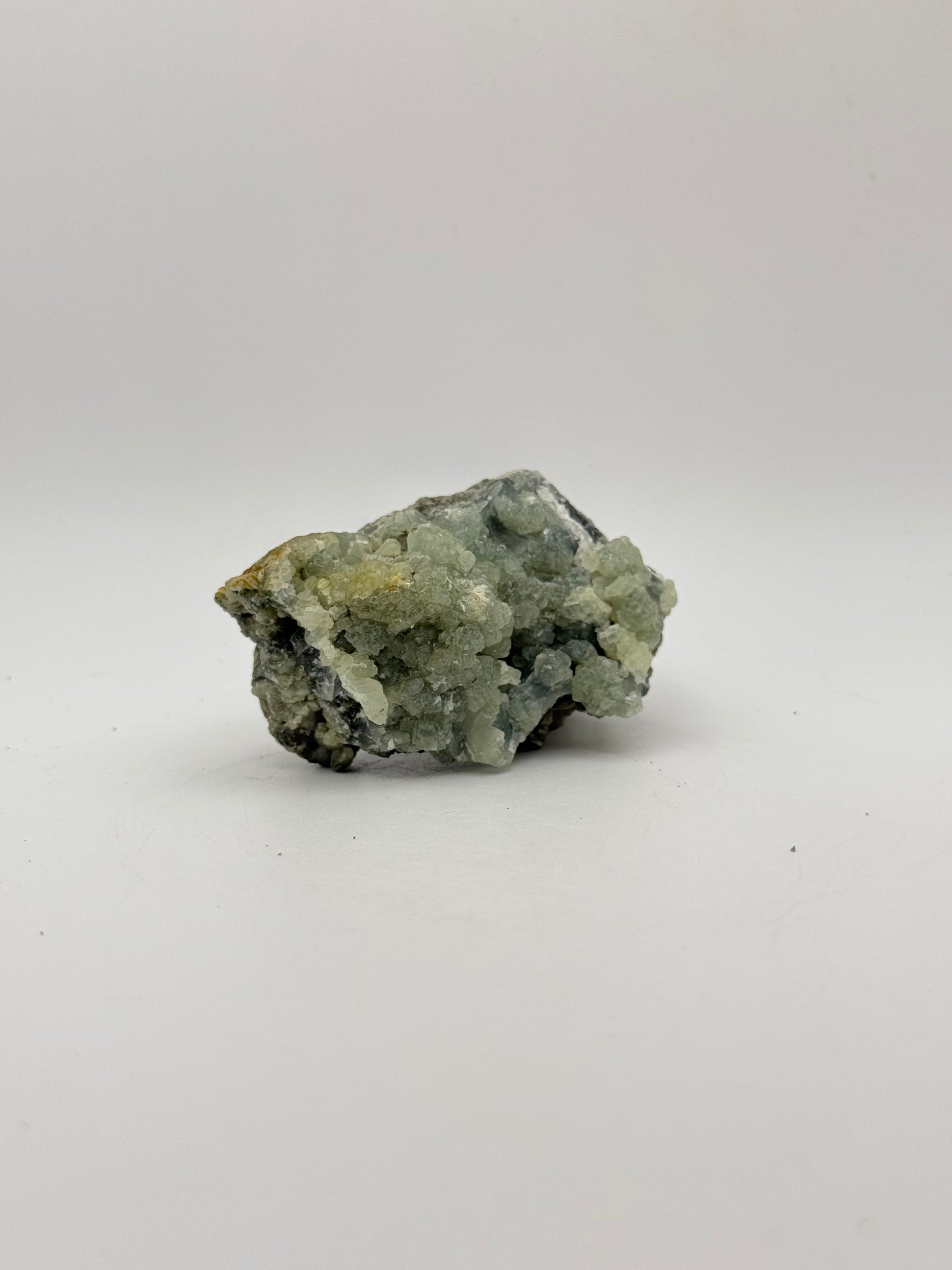 Raw prehnite specimen with amazing green color.