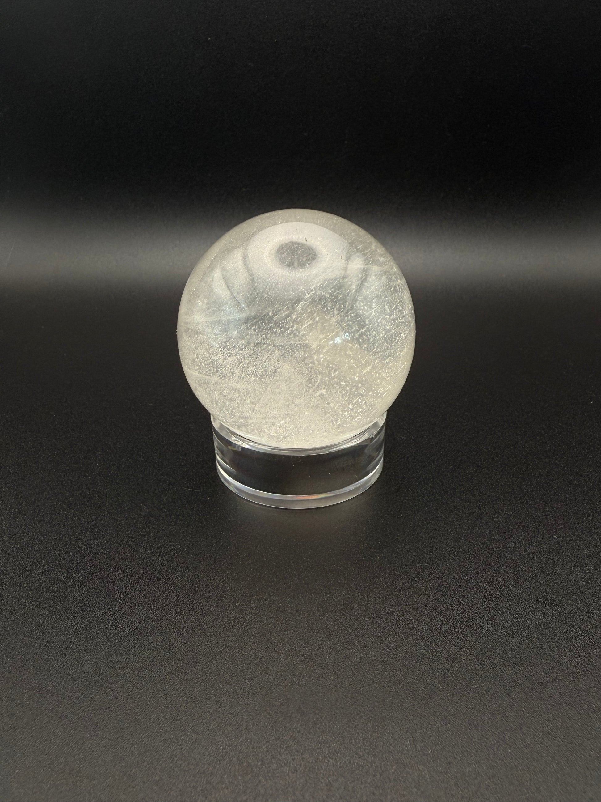Clear quartz polished crystal sphere.