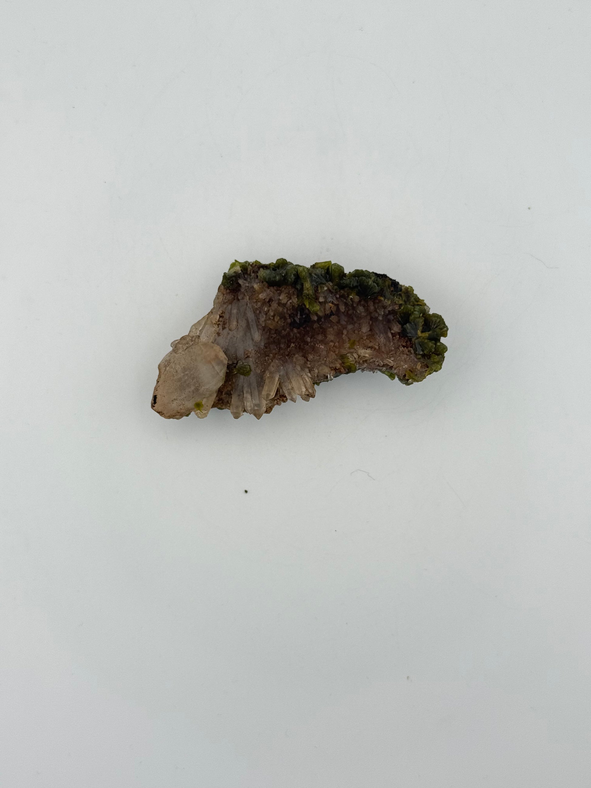 Epidote crystal cluster with good green color.