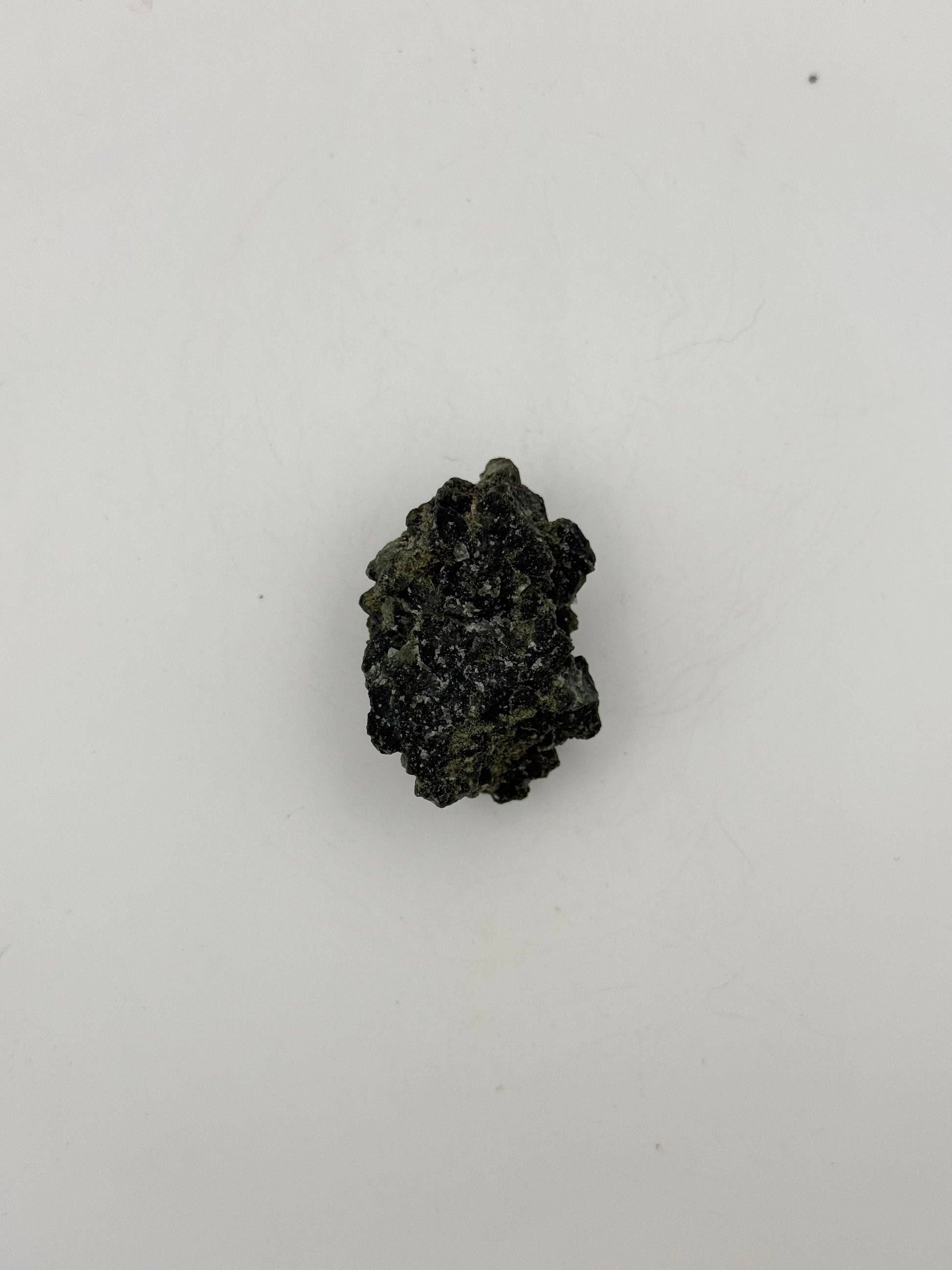 Raw prehnite specimen with amazing green color.