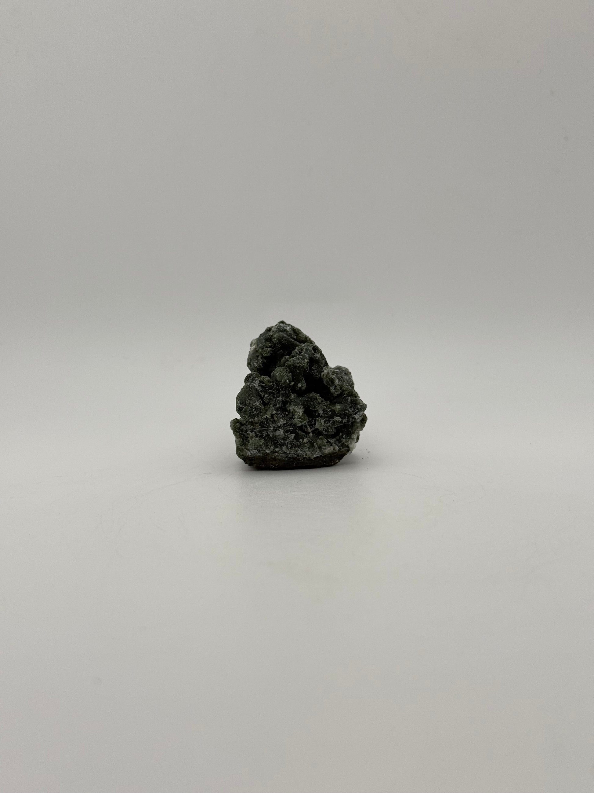 Raw prehnite specimen with amazing green color.