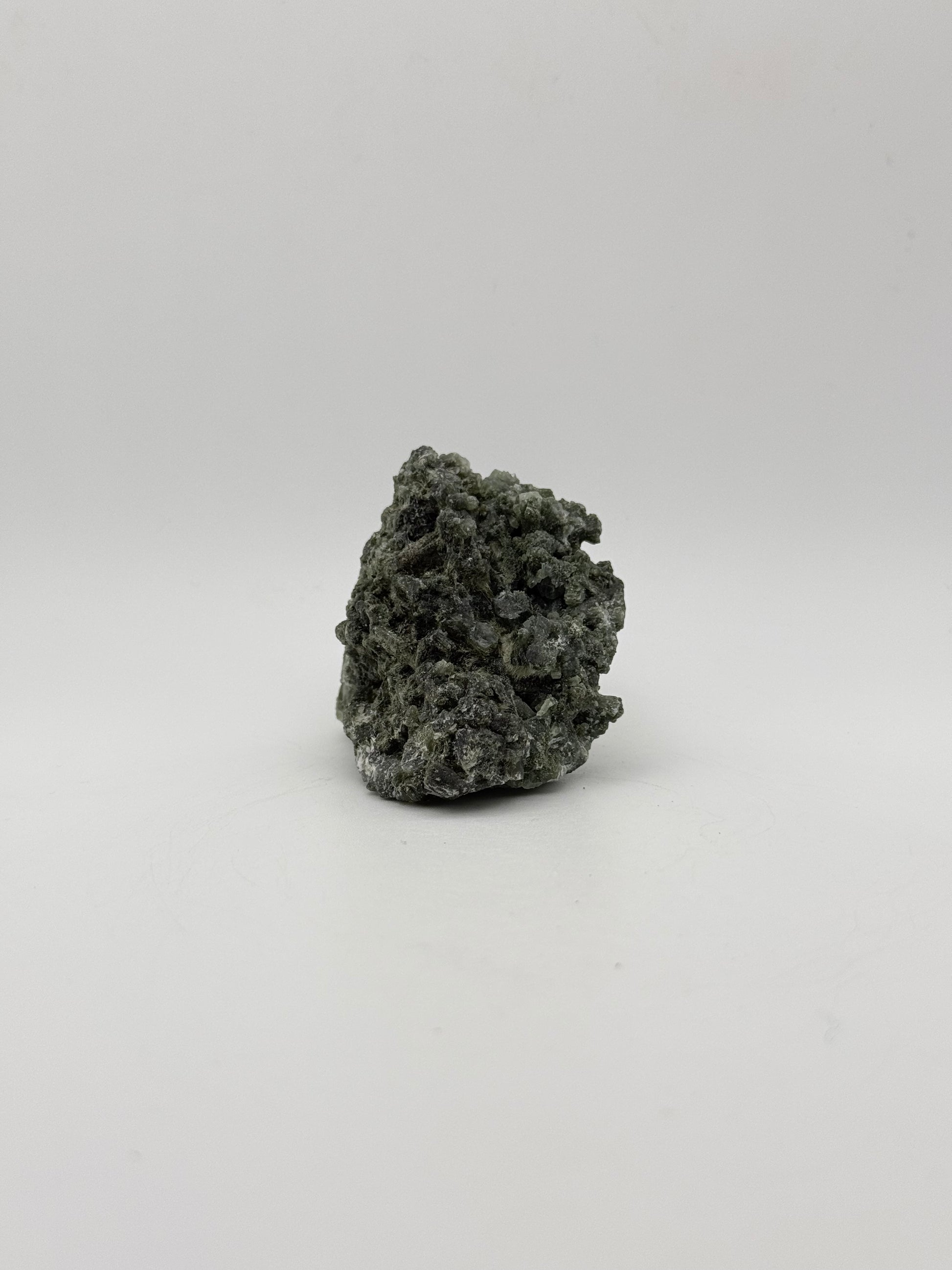 Raw prehnite specimen with amazing green color.