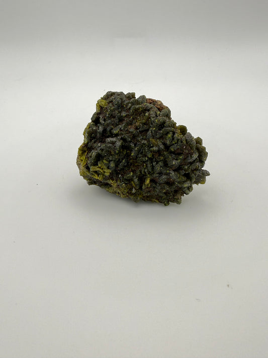 Epidote crystal cluster with good green color.