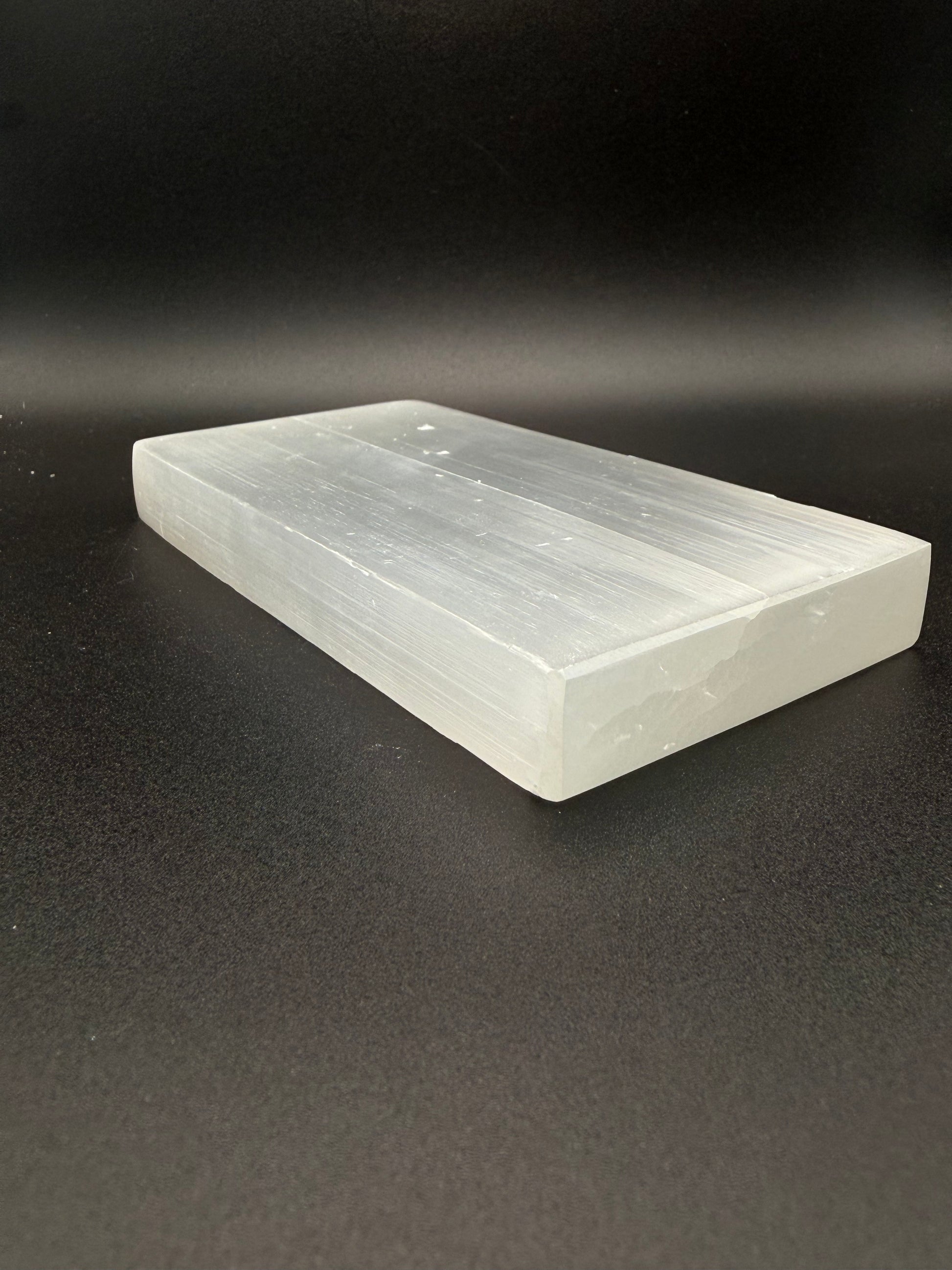 Selenite plate in the shape of a rectangle.