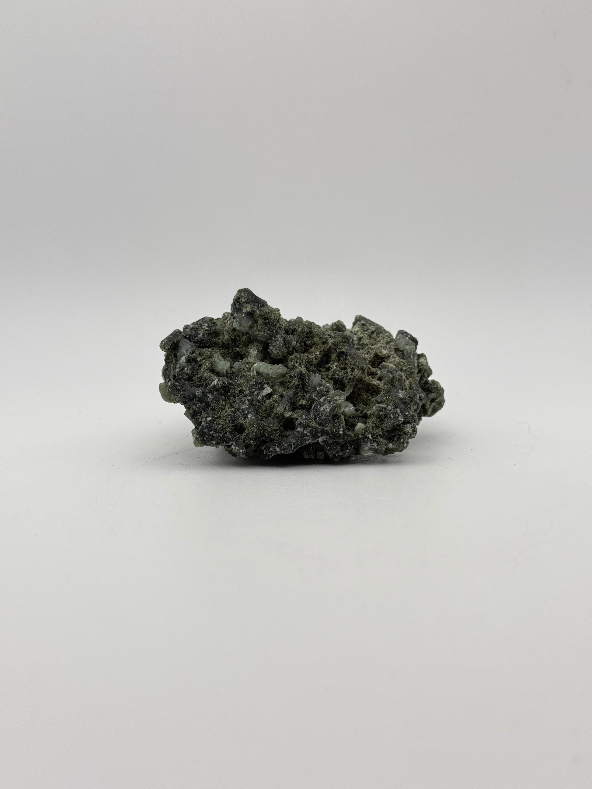 Raw prehnite specimen with amazing green color.