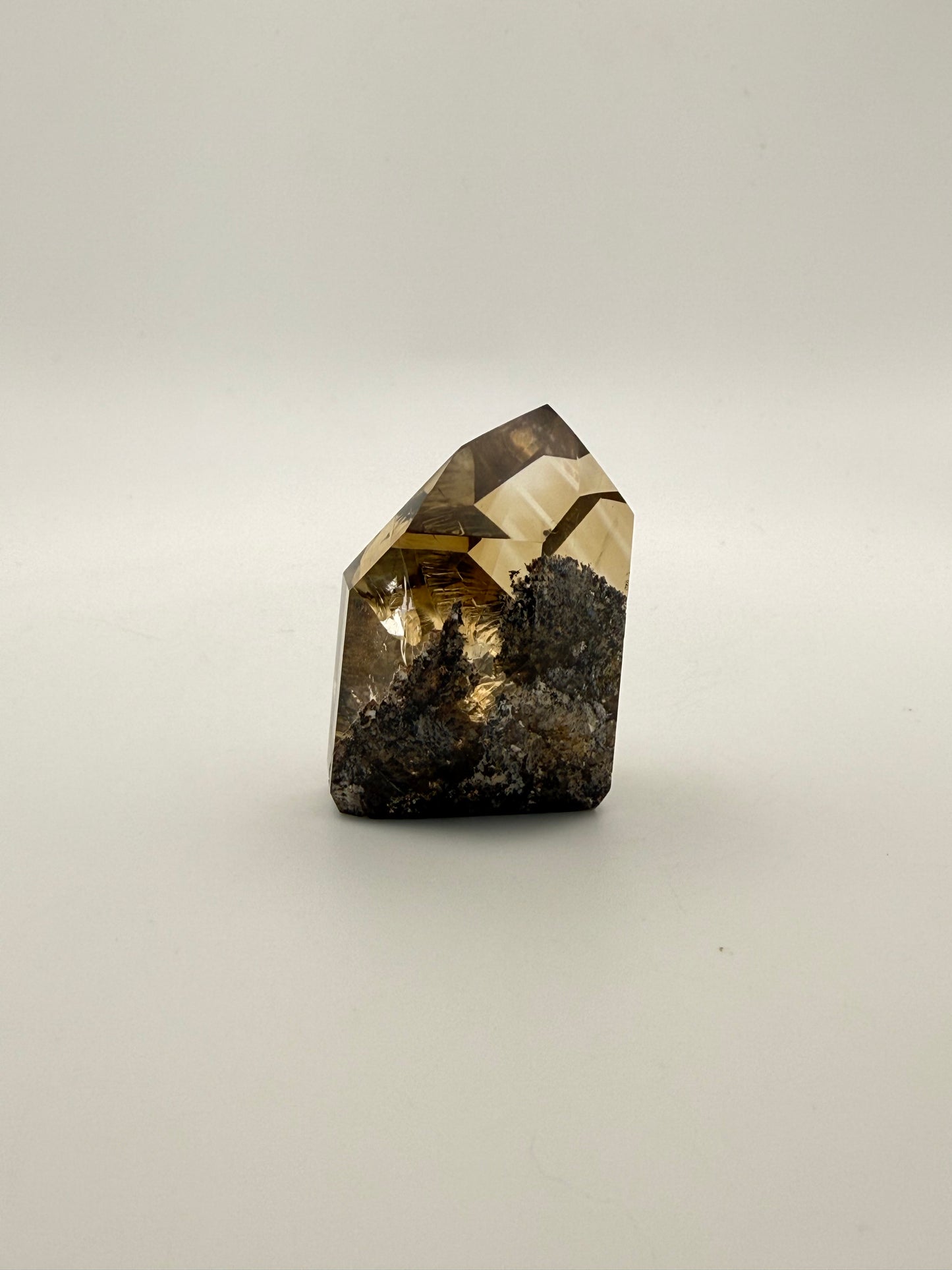 Polished natural citrine point.