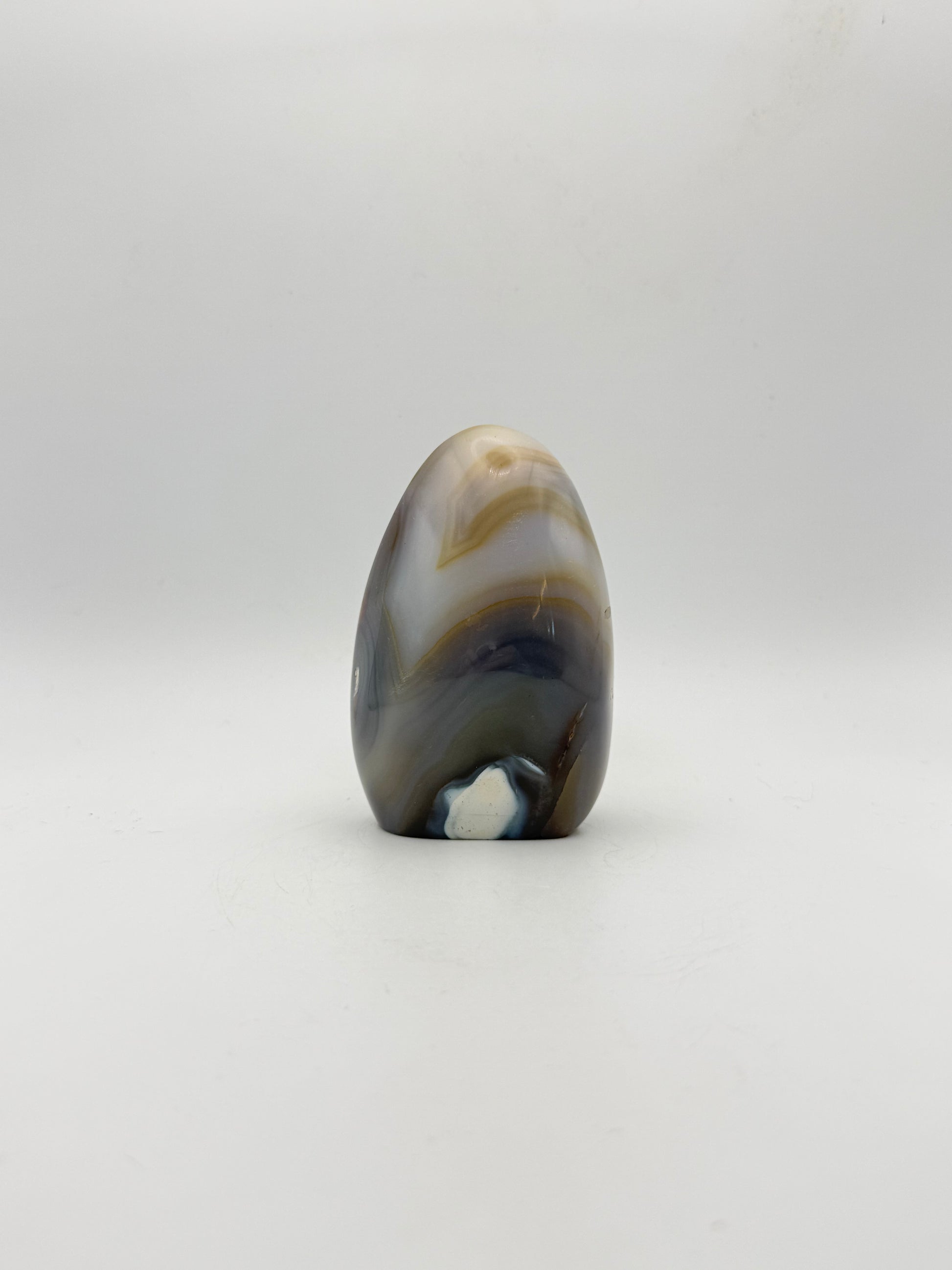 Polished orca agate free form.